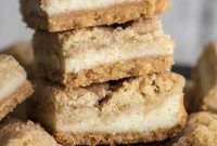 Snickerdoodle Swirl Cheesecake Bars