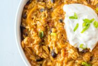 Creamy Slow Cooker Cheesy Chicken Taco Rice
