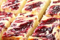 Zesty Lemon Raspberry Cheesecake Bars