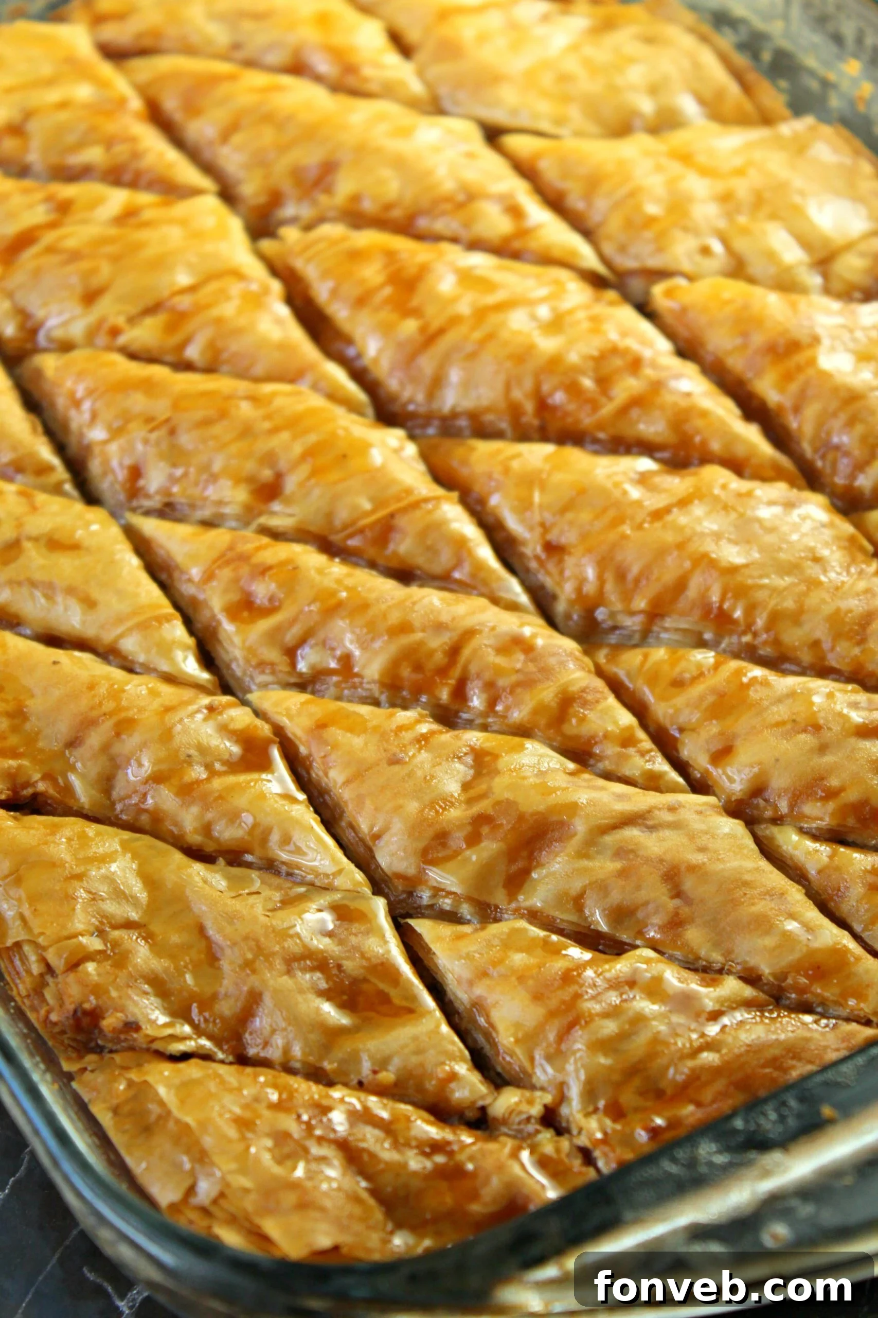 Grandma's Baklava 2 Golden, flaky homemade baklava squares with chopped nuts