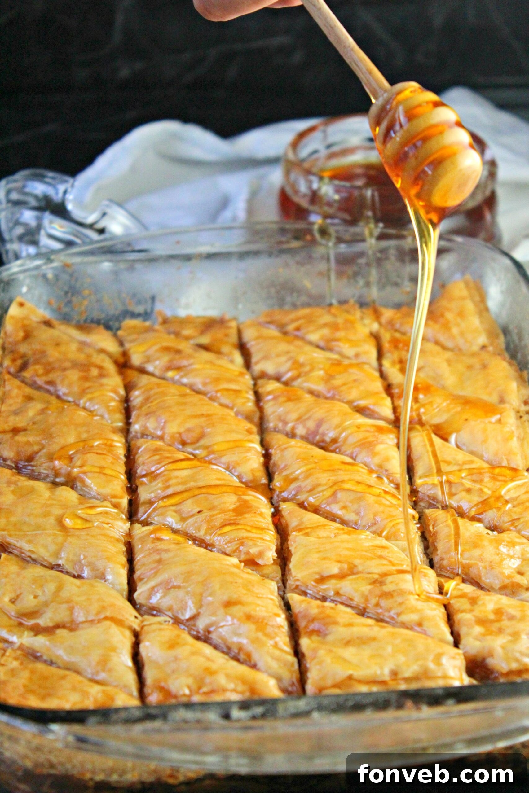 Grandma's Baklava 3 Close-up of baklava layers with honey drizzle