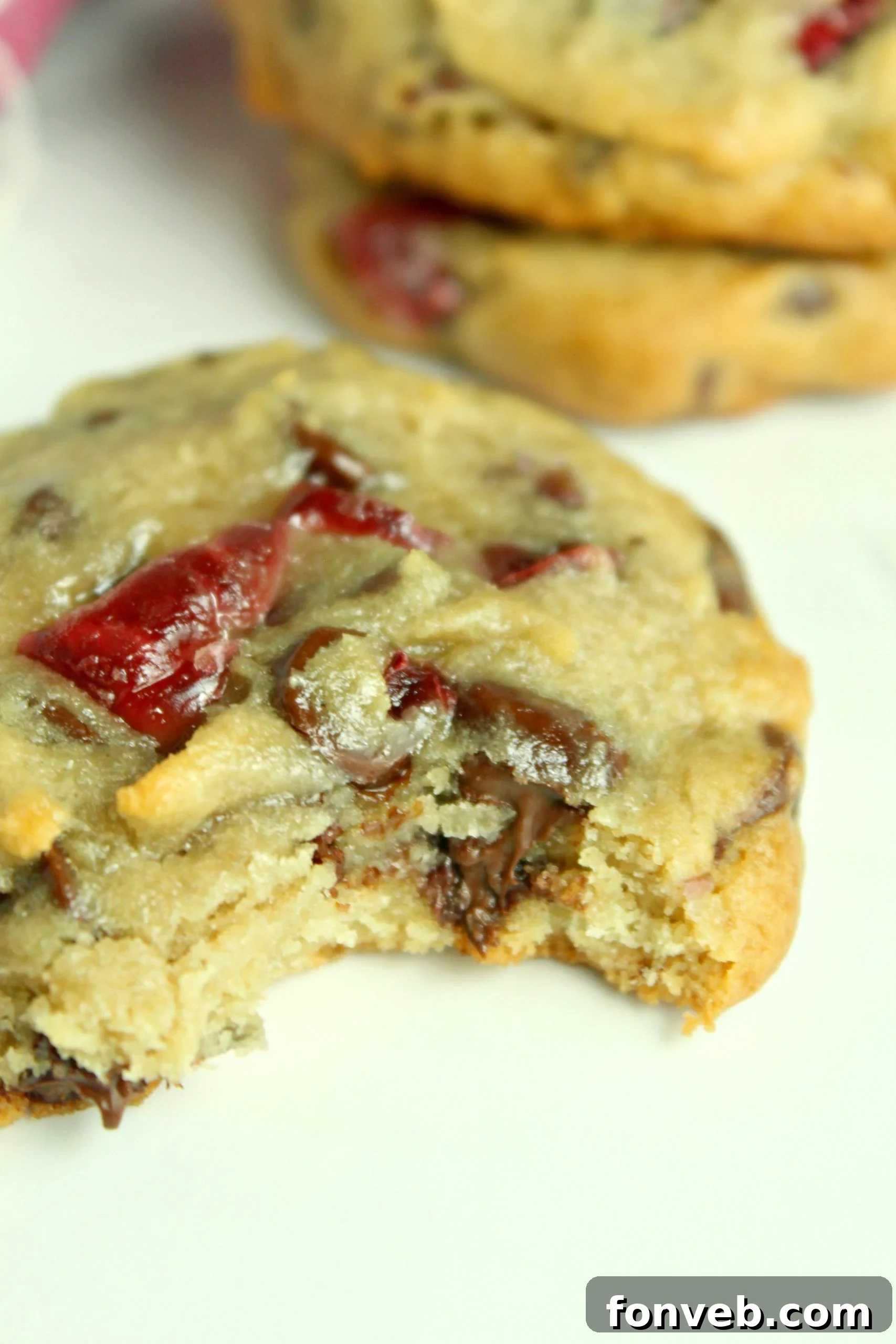 Stack of homemade Cherry Garcia Cookies with chocolate chips and dried cherries