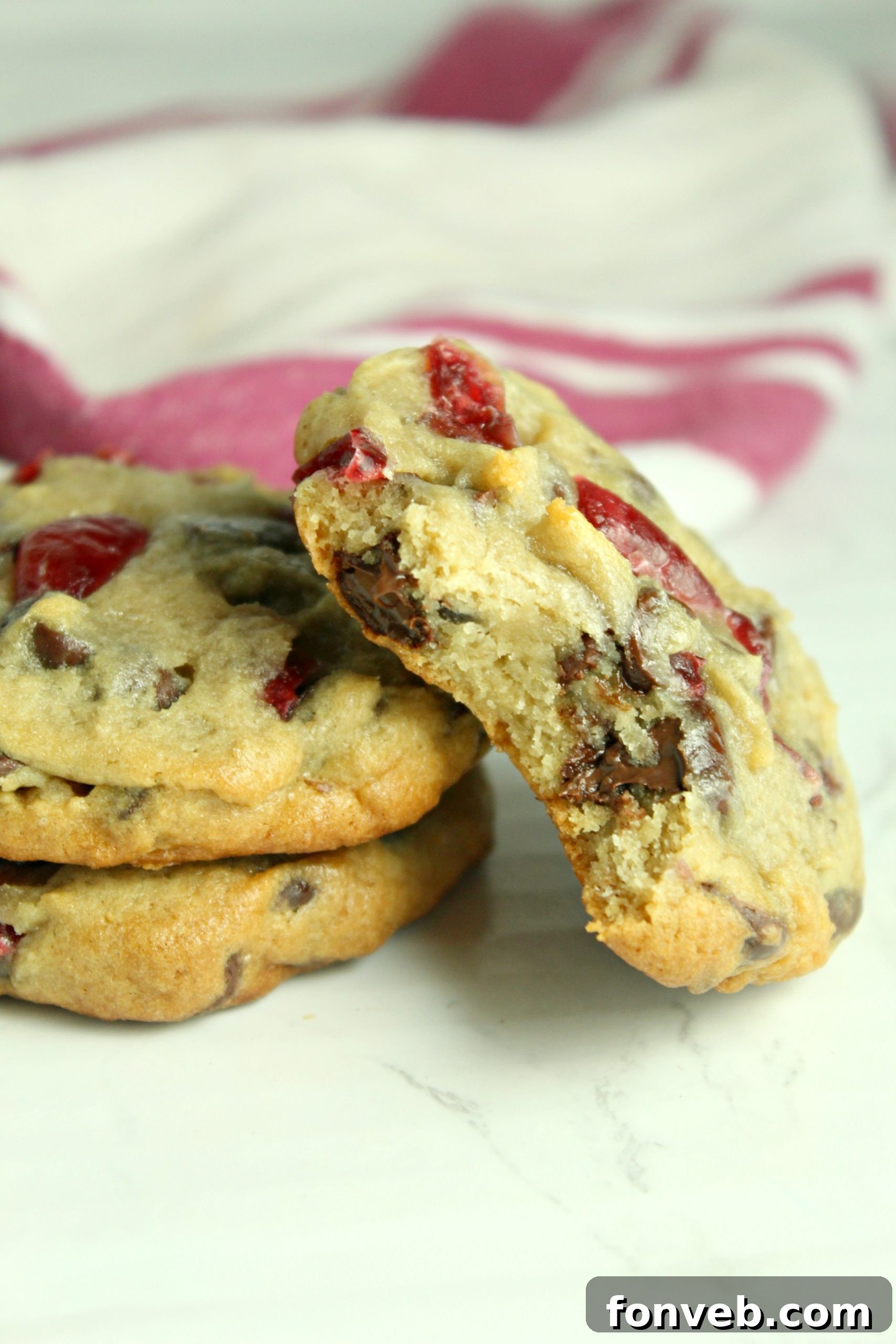 Overhead shot of Cherry Garcia Cookie dough with chocolate chips and quartered cherries mixed in