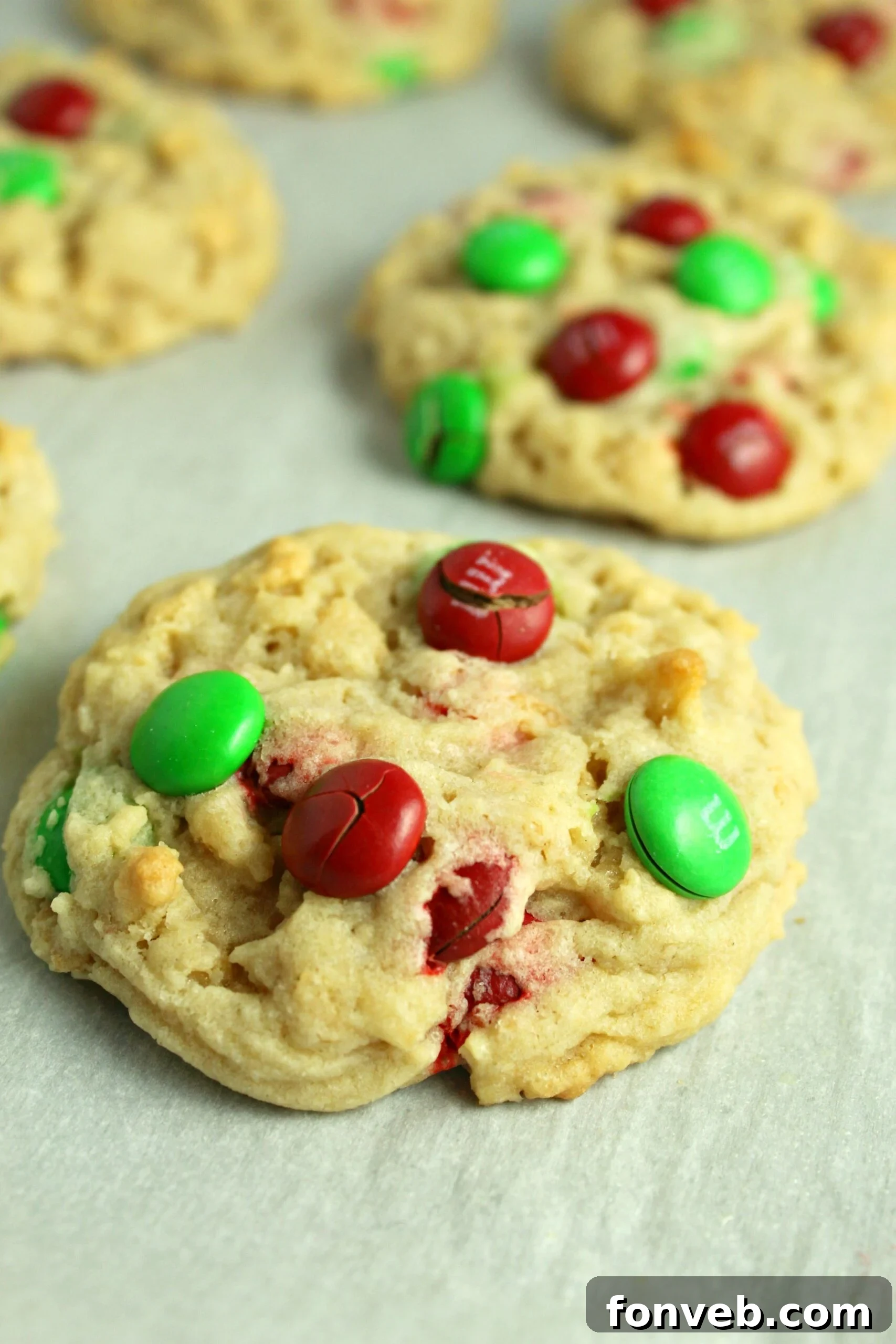 Close-up of a stack of Rice Krispie M&M Cookies, showing their colorful M&Ms.