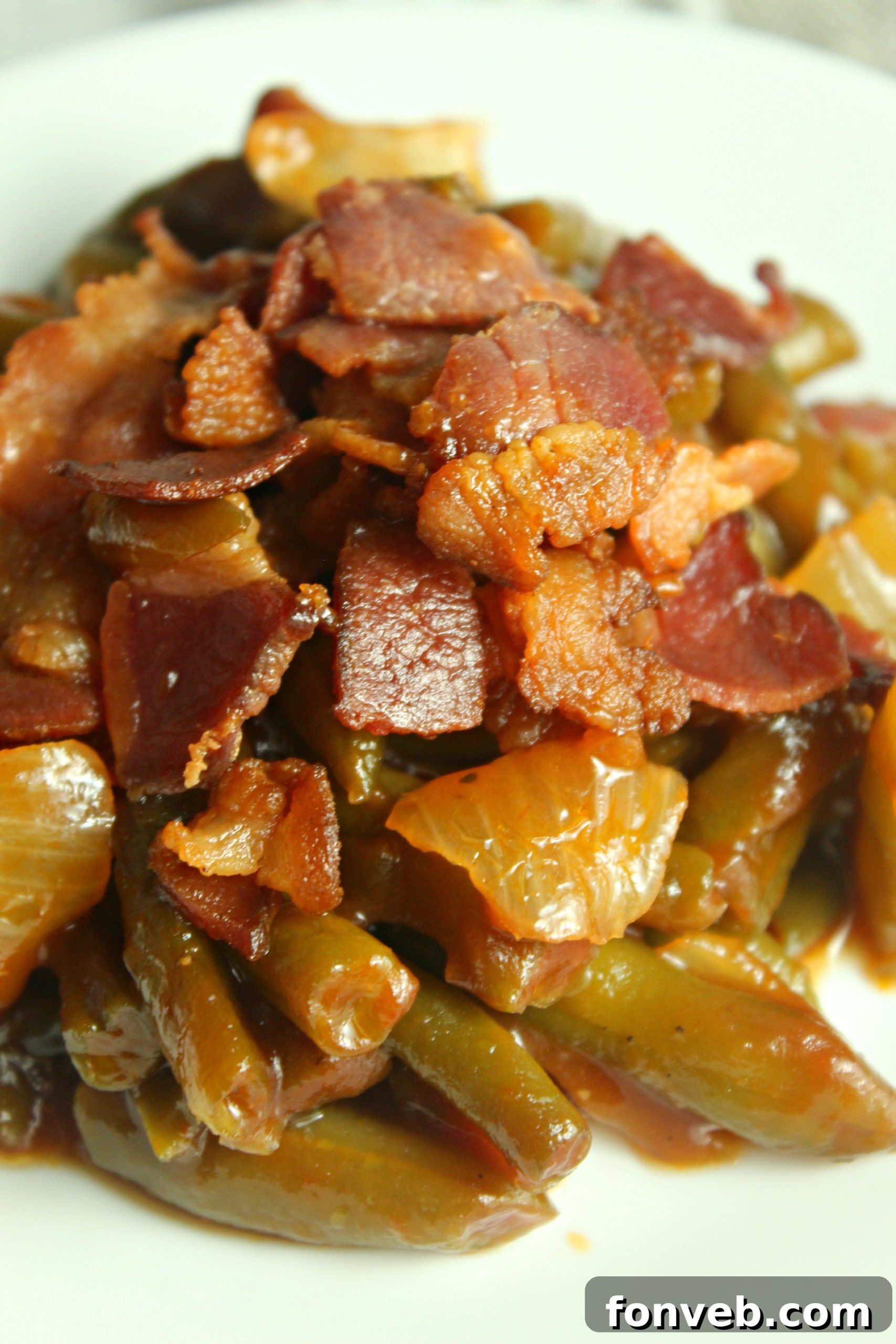 Hearty Slow Cooker Smothered BBQ Green Beans 6 A slow cooker filled with the barbecue green bean mixture, ready to cook