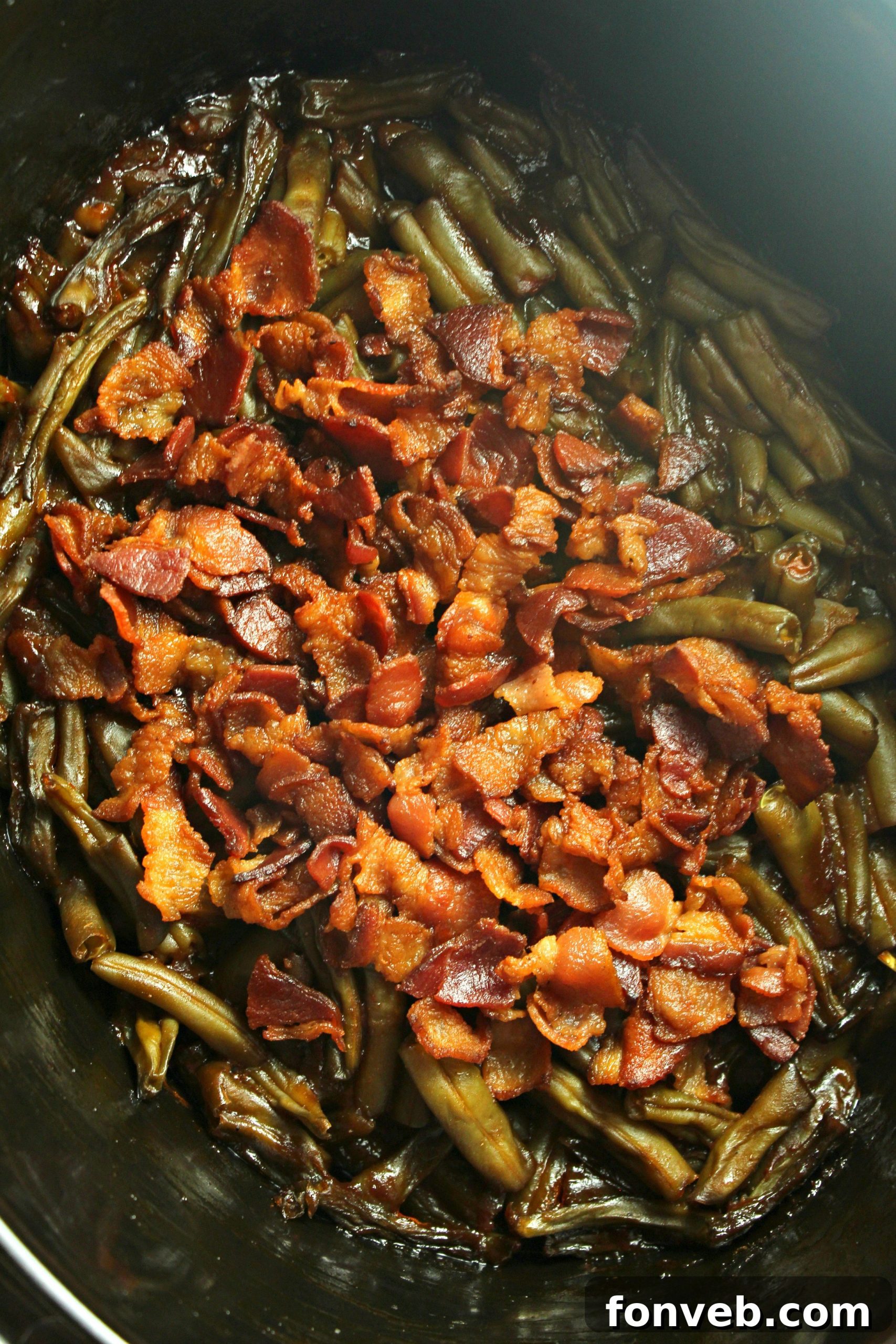 Hearty Slow Cooker Smothered BBQ Green Beans 9 Slow Cooker Smothered Barbecue Green Beans in a serving dish, ready for the table