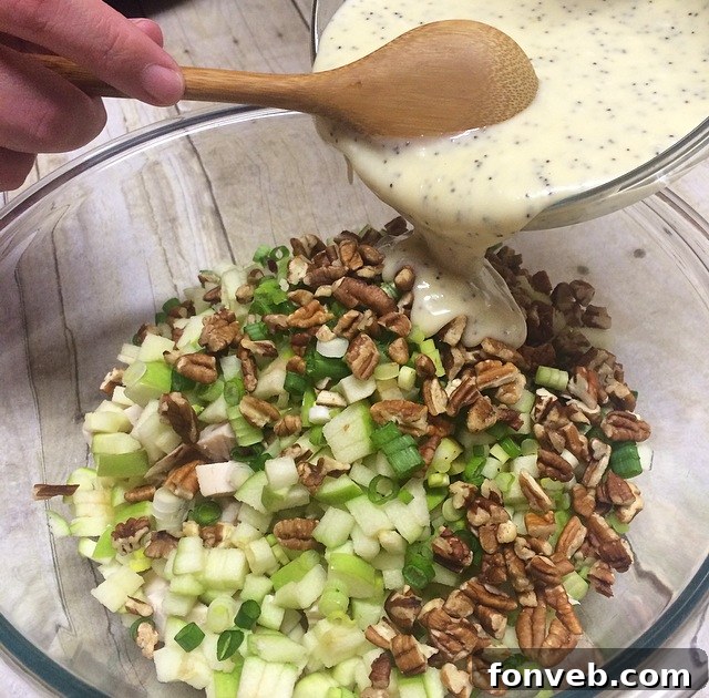 Mixing Lemon Poppy Seed Chicken Salad dressing