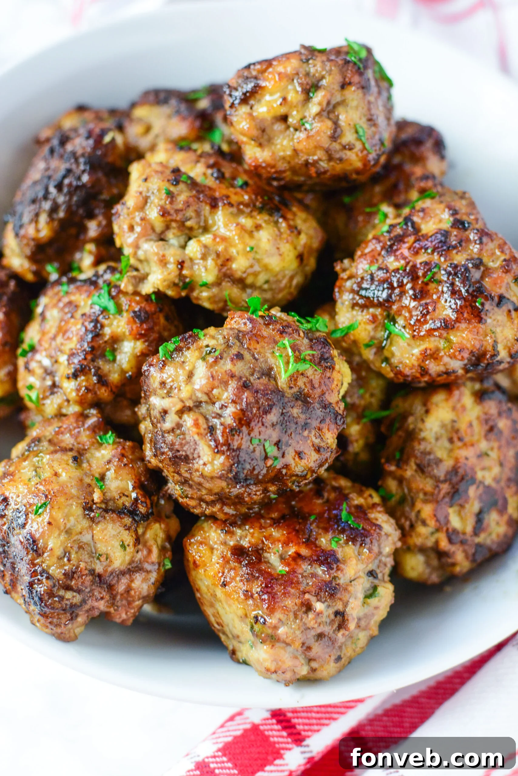 Delicious baked Italian meatballs, perfectly golden brown and ready to be served.