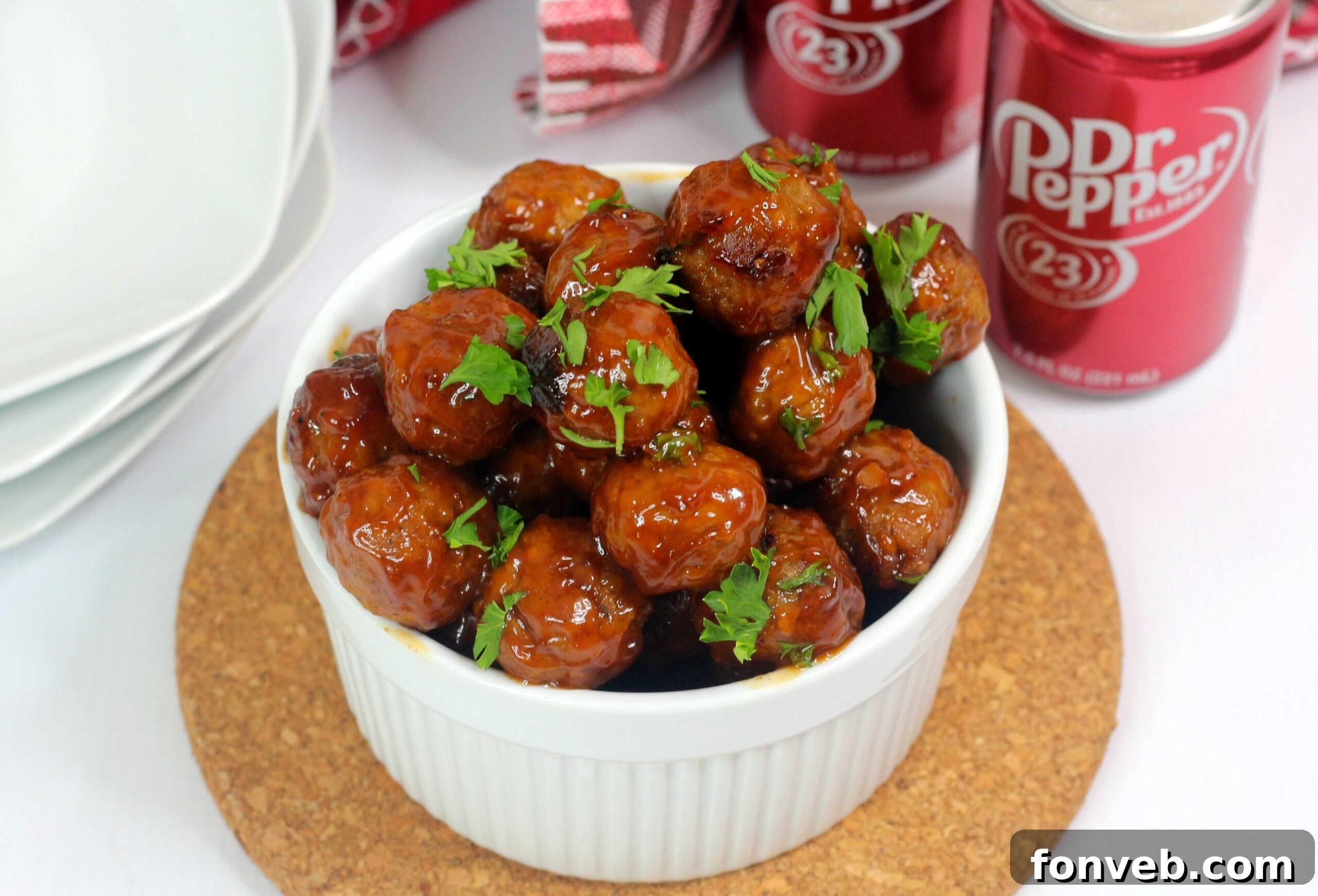 Close-up of tender Dr Pepper Meatballs in a sauce