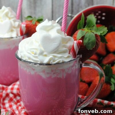A top-down view of a Pink Velvet Hot Chocolate recipe card with a small image of the finished drink.
