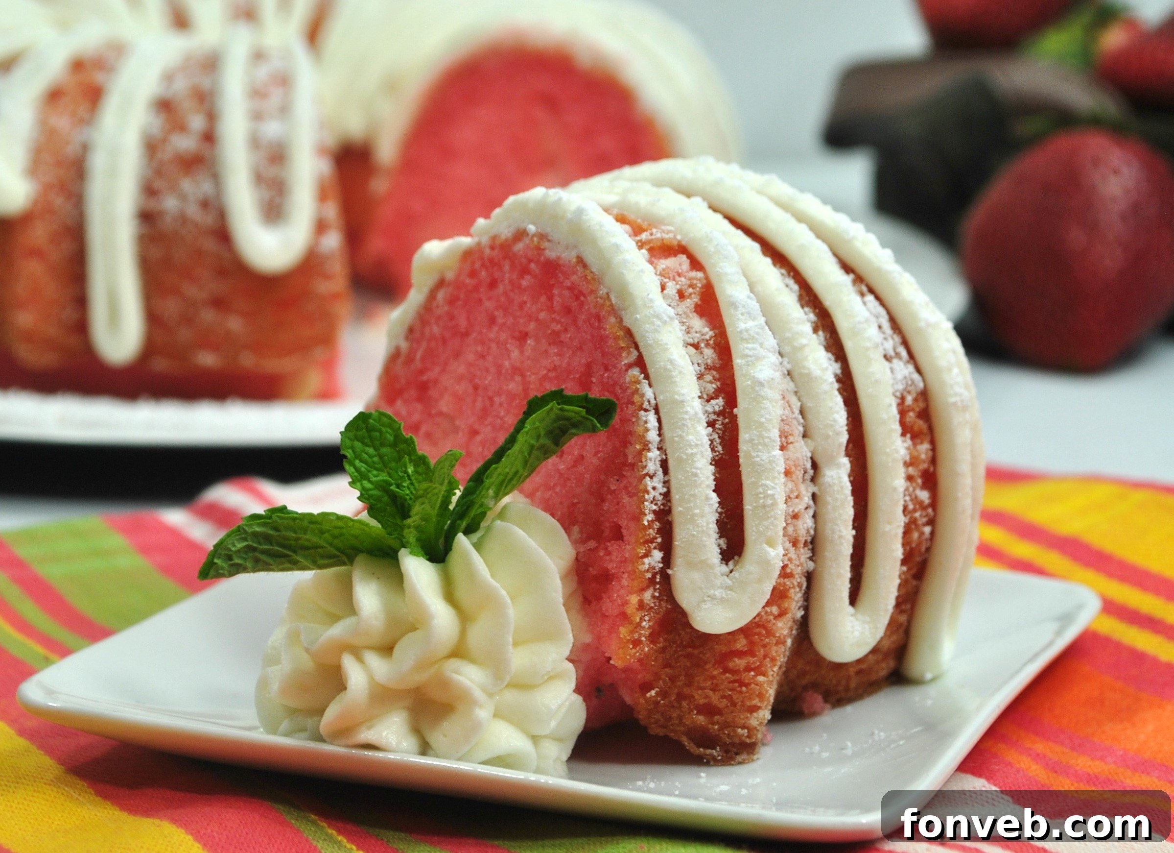 Close-up of the Strawberries & Cream Bundt Cake, showcasing its golden-brown crust and inviting texture, ready to be frosted.