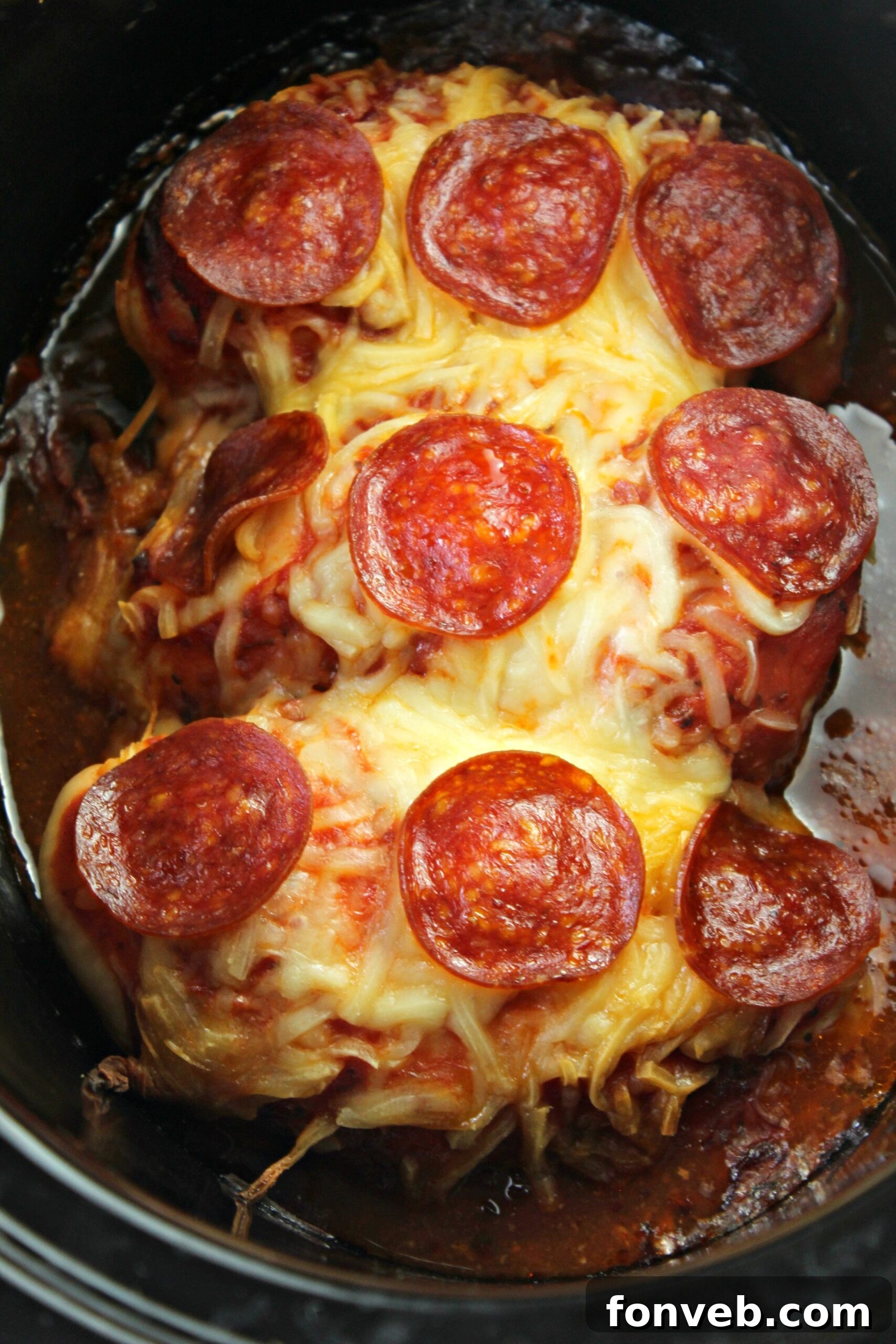 Prepared Slow Cooker Pizza Chicken, served with a side salad