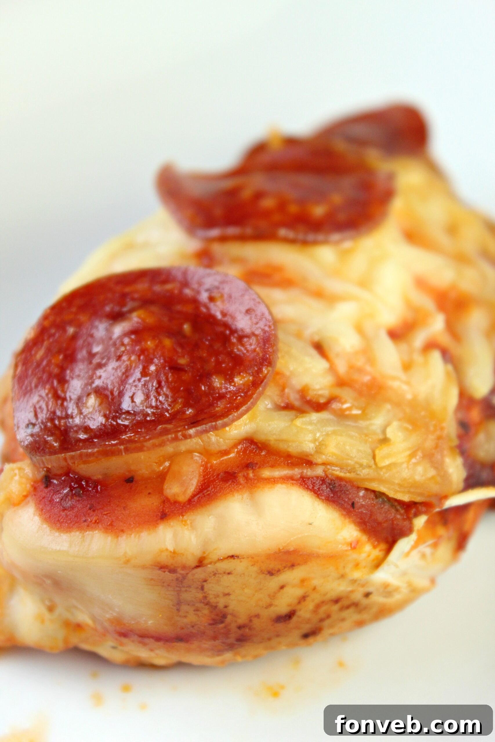Overhead view of Slow Cooker Pizza Chicken with various toppings