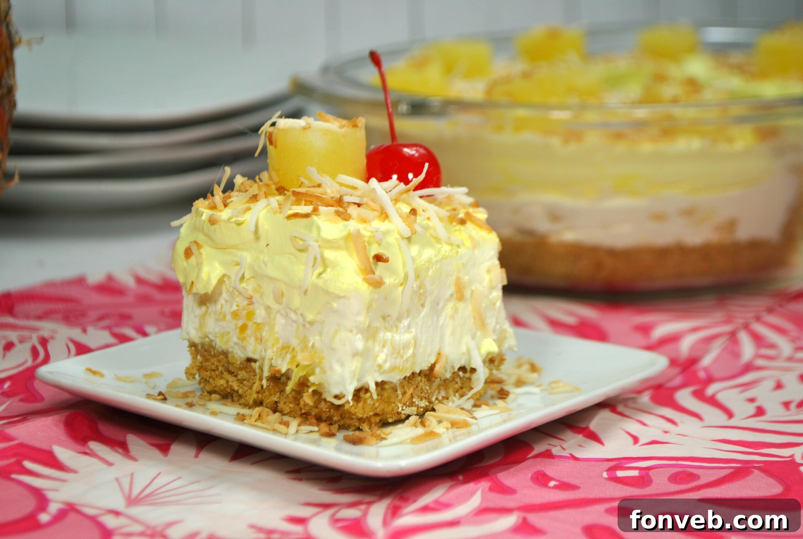 Close-up of fluffy No-Bake Pineapple Dream Dessert with whipped topping