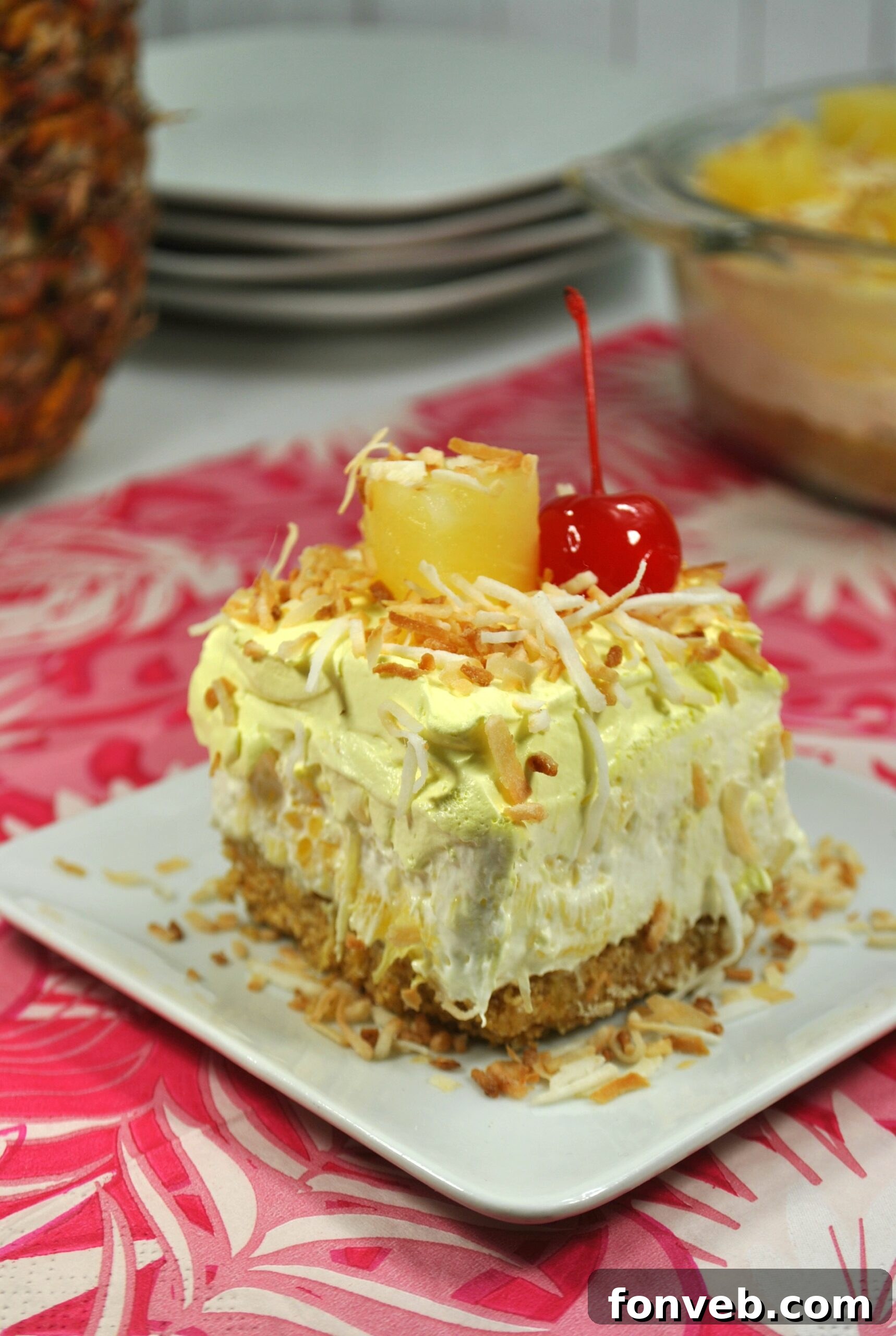 Chilled No-Bake Pineapple Dream Dessert slices on a serving platter
