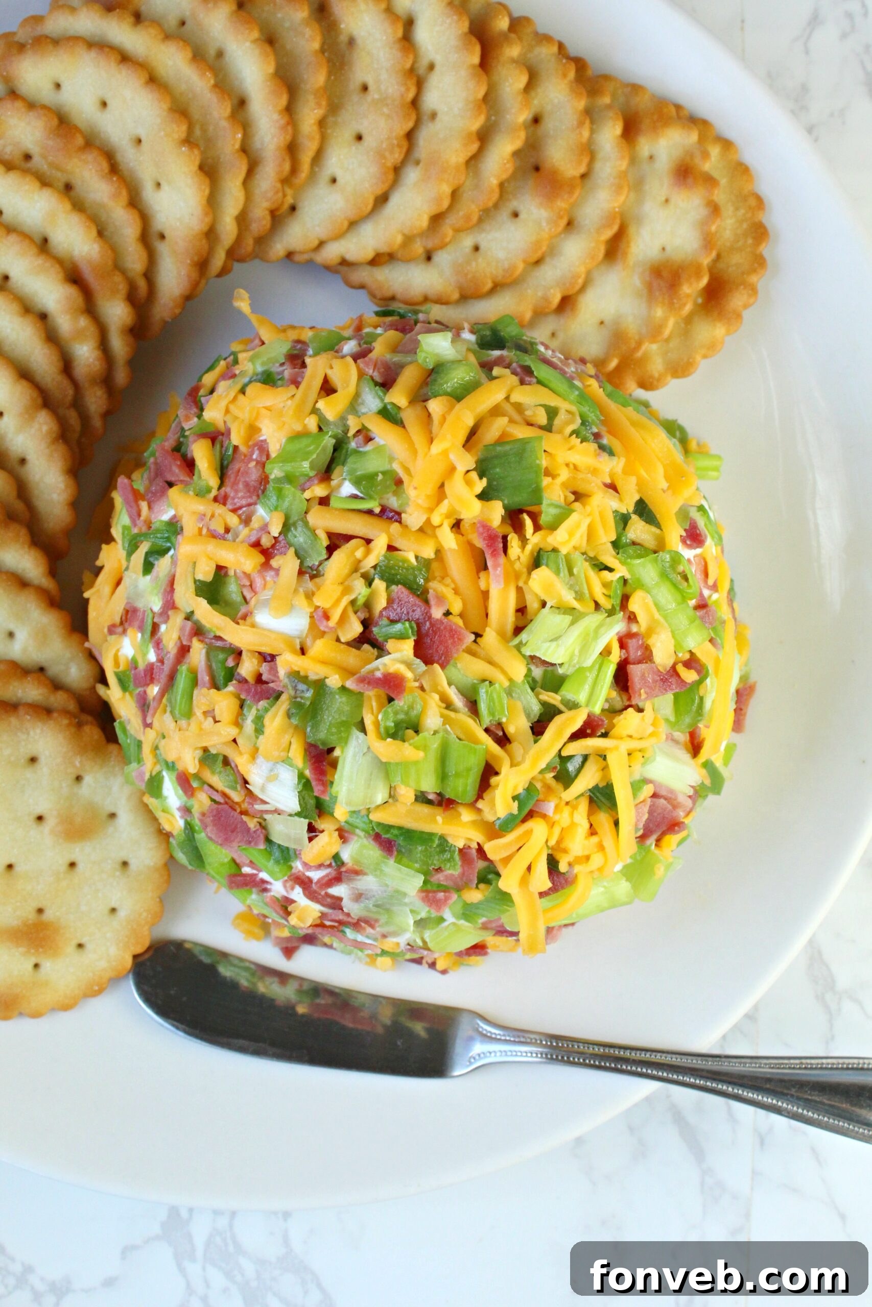 Spicy Cream Cheese Party Ball 9 A close-up view of a perfectly coated Jalapeno Popper Cheese Ball