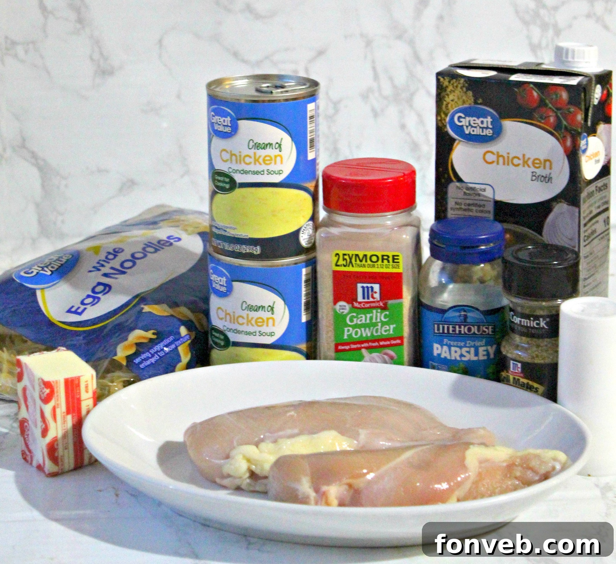 A close-up of Slow Cooker Chicken and Noodles in a serving bowl, highlighting the steam and rich consistency.