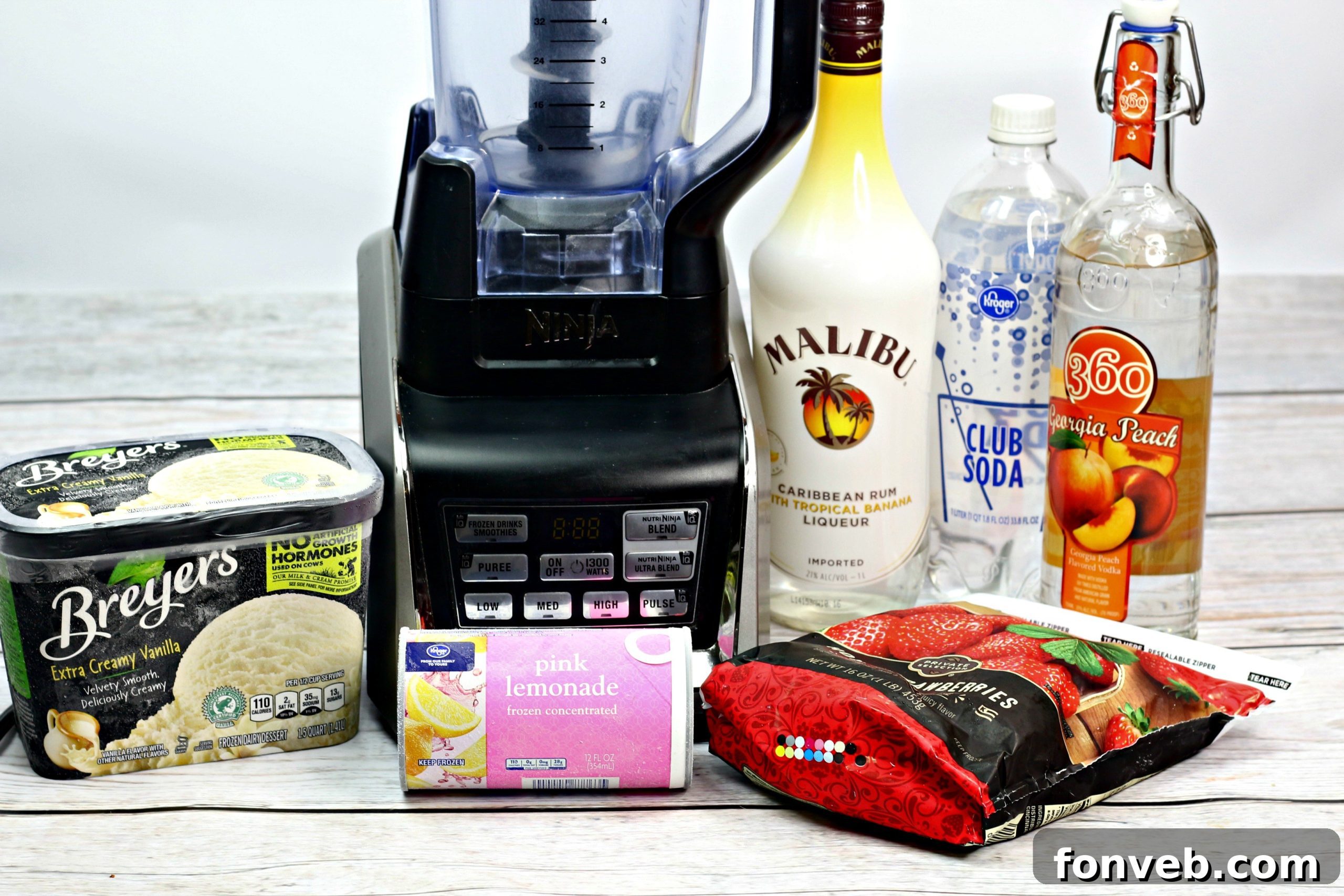 Secret Blush 3 Two glasses of Pink Panties Cocktails on a pink background, ready to be served.