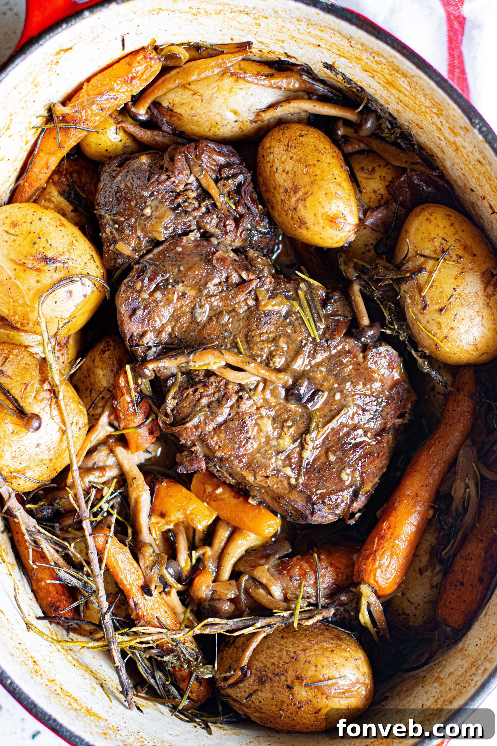 A delicious pot roast meal with red wine, emphasizing a perfect pairing.
