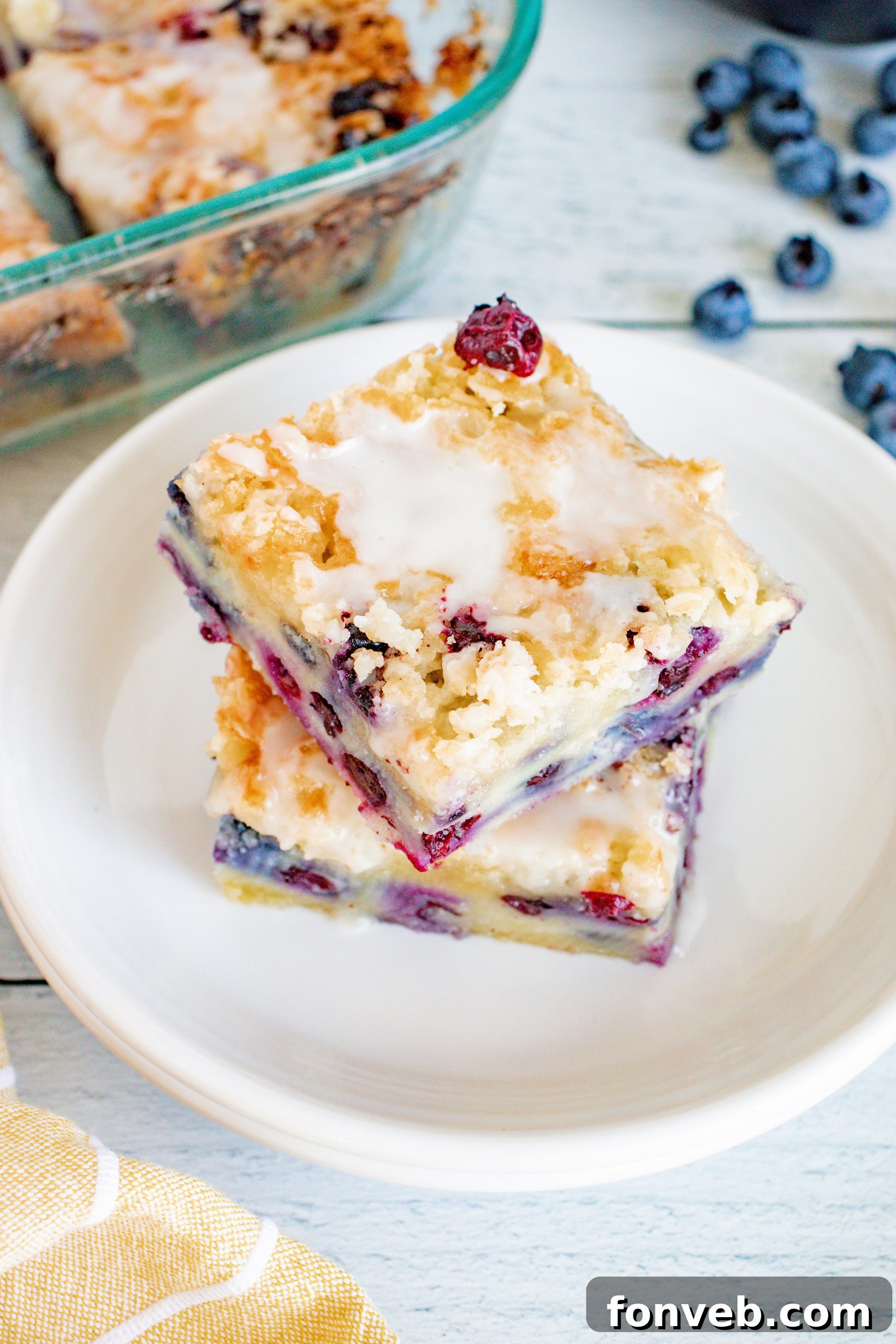 Blueberry Muffin Crumble Cake with Vanilla Drizzle 6 Freshly baked blueberry muffin cake, showing the golden streusel and glaze.