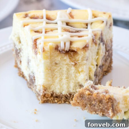 Thumbnail image of Cinnamon Roll Cheesecake with a creamy topping, ready to be prepared.