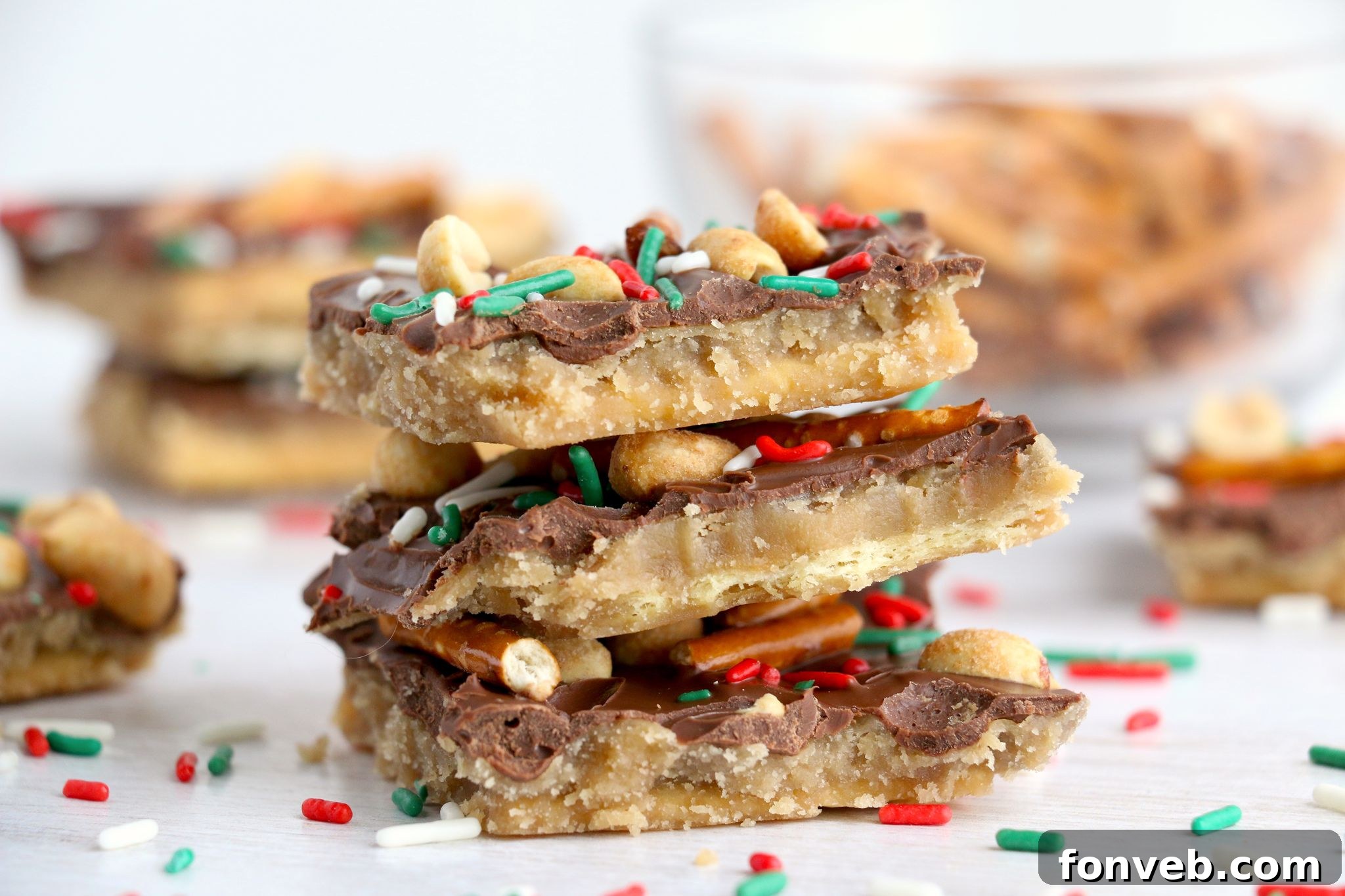 Toffee Pretzel Peanut Bark 4 Close-up of Pretzel Peanut Cracker Toffee adorned with colorful sprinkles, showcasing its texture.