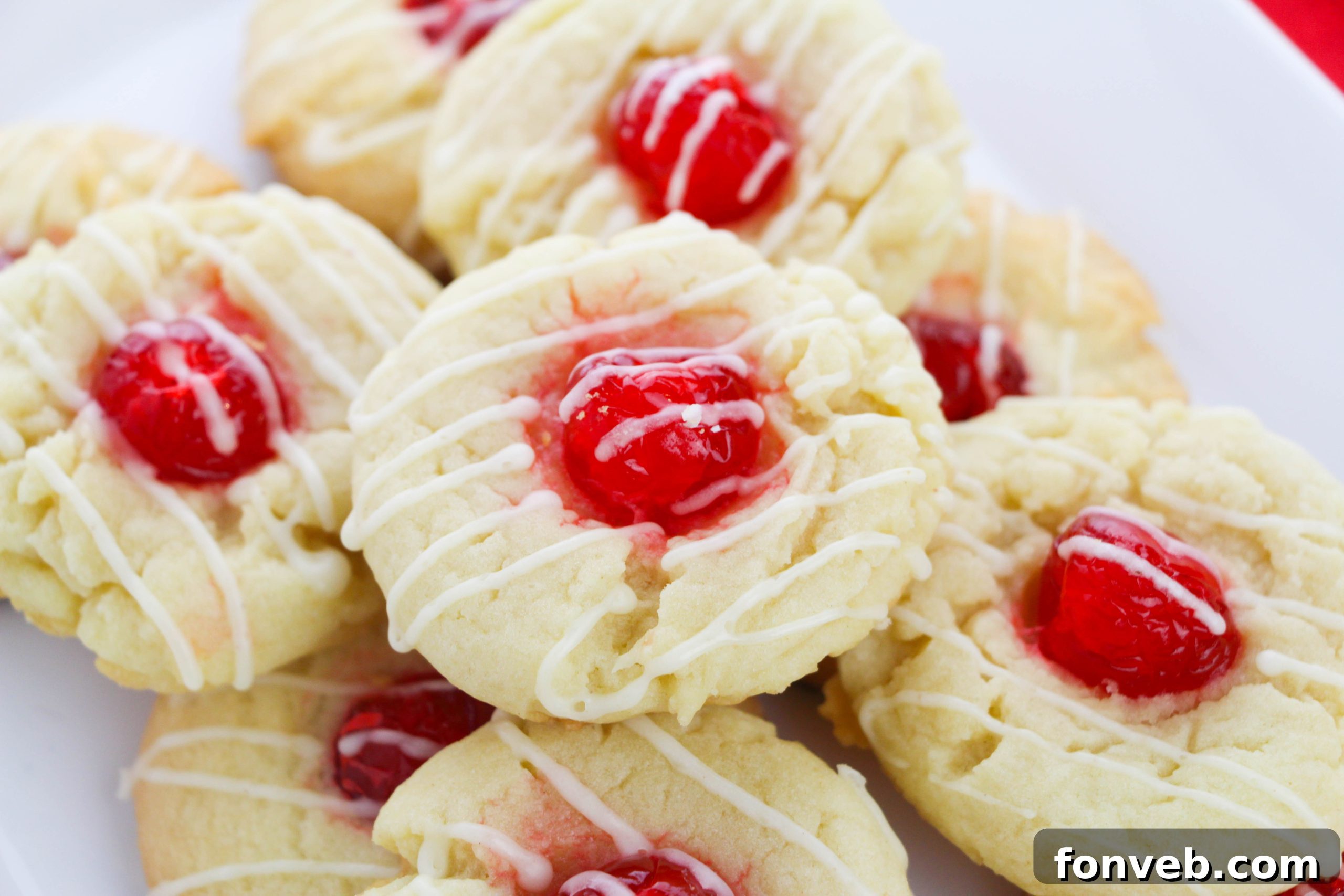 Eggnog Thumbprint Cookies presented on a festive Christmas plate, ready to be enjoyed