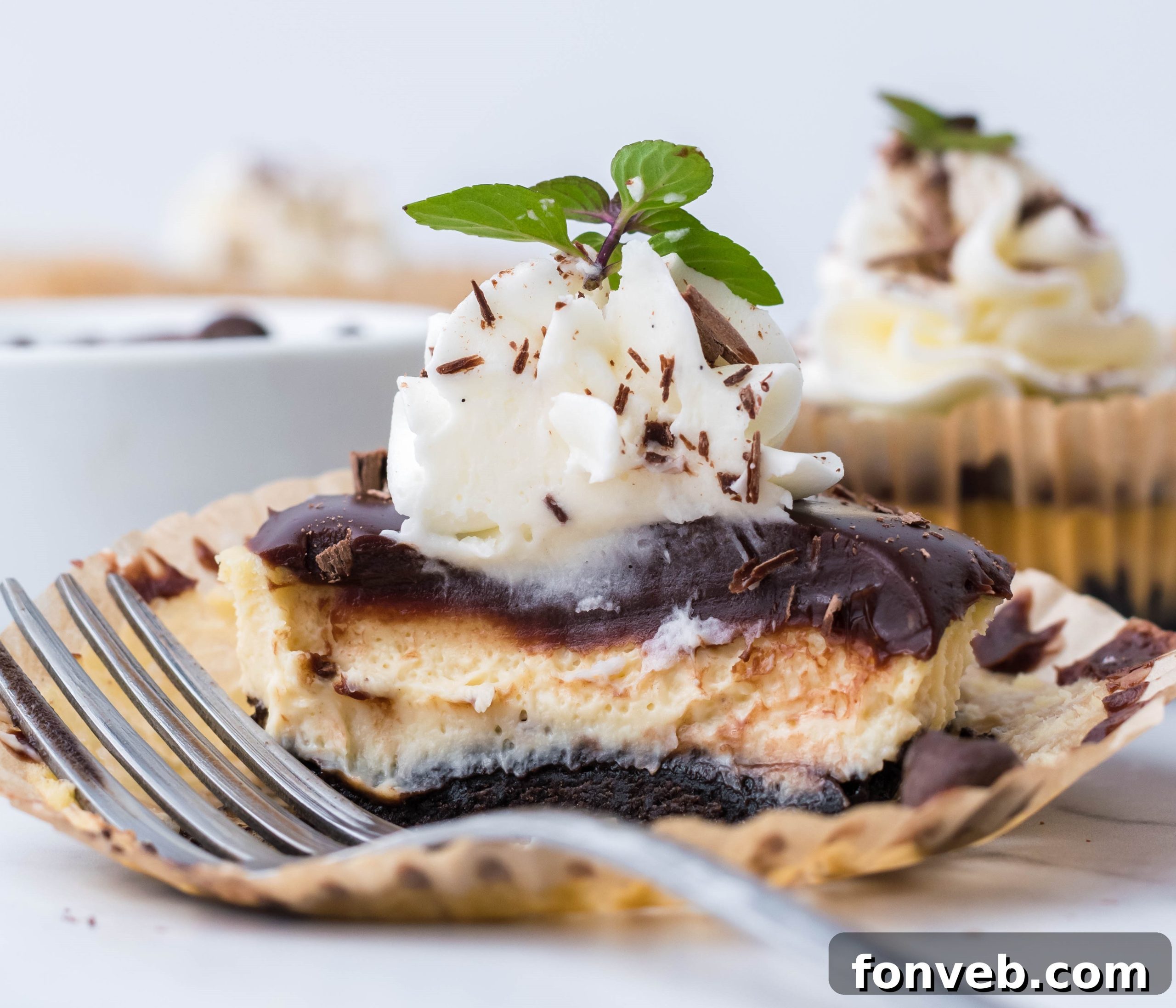 Close-up of a perfectly baked mini Baileys cheesecake before frosting