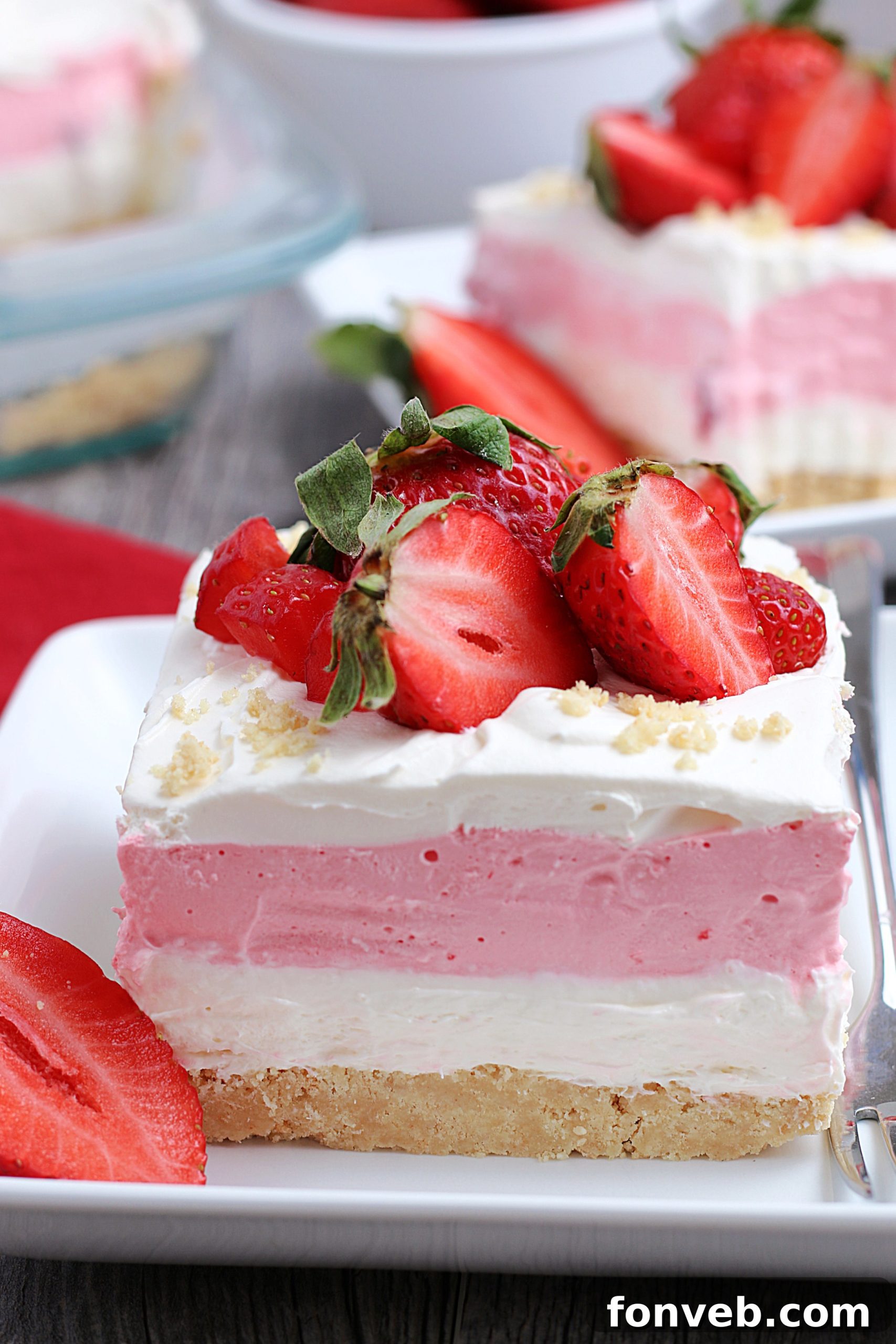 Full pan of No-Bake Strawberry Cheesecake Lasagna ready to be served at a party