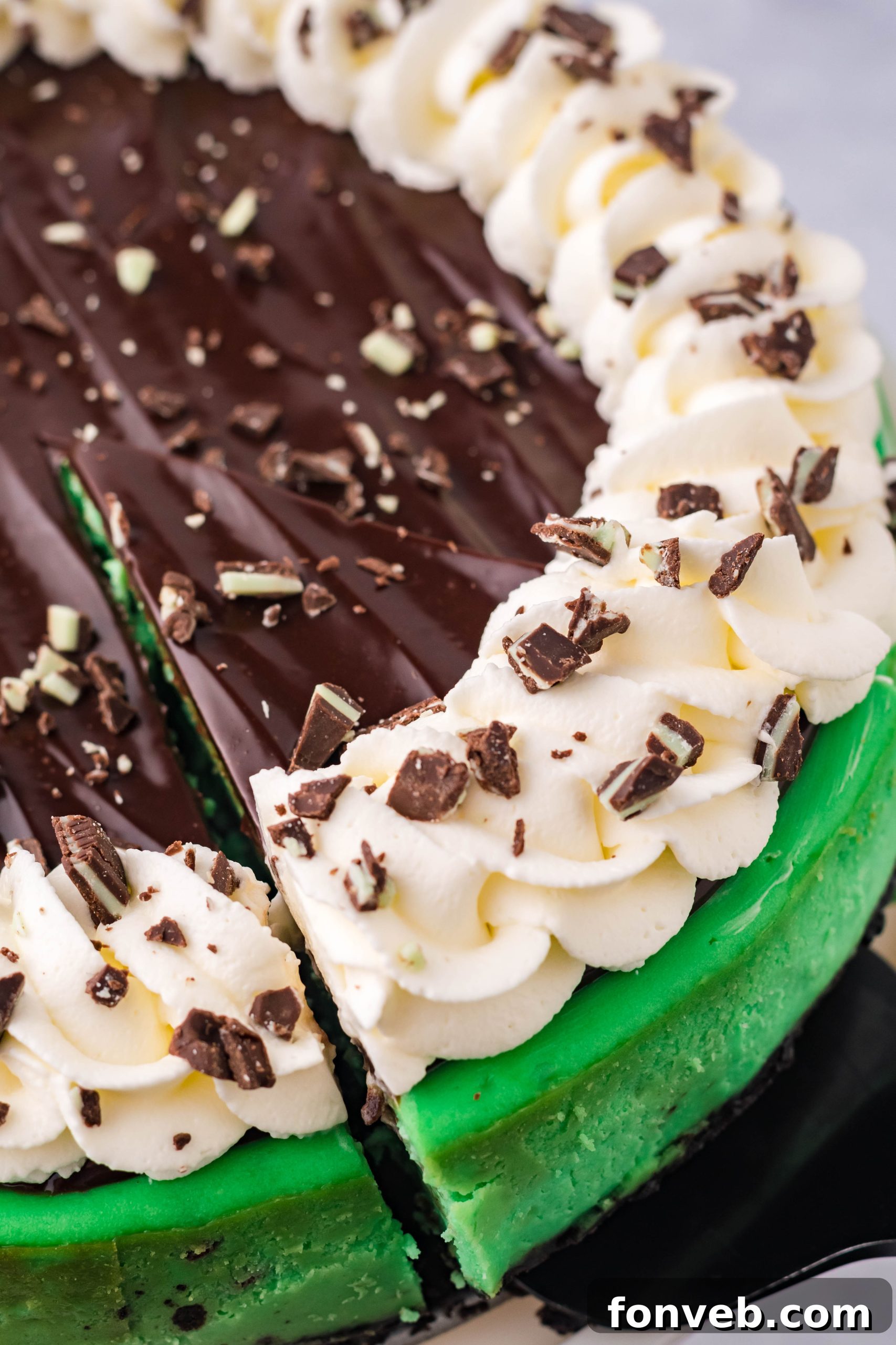A top-down view of the baked Grasshopper Cheesecake before the ganache is applied