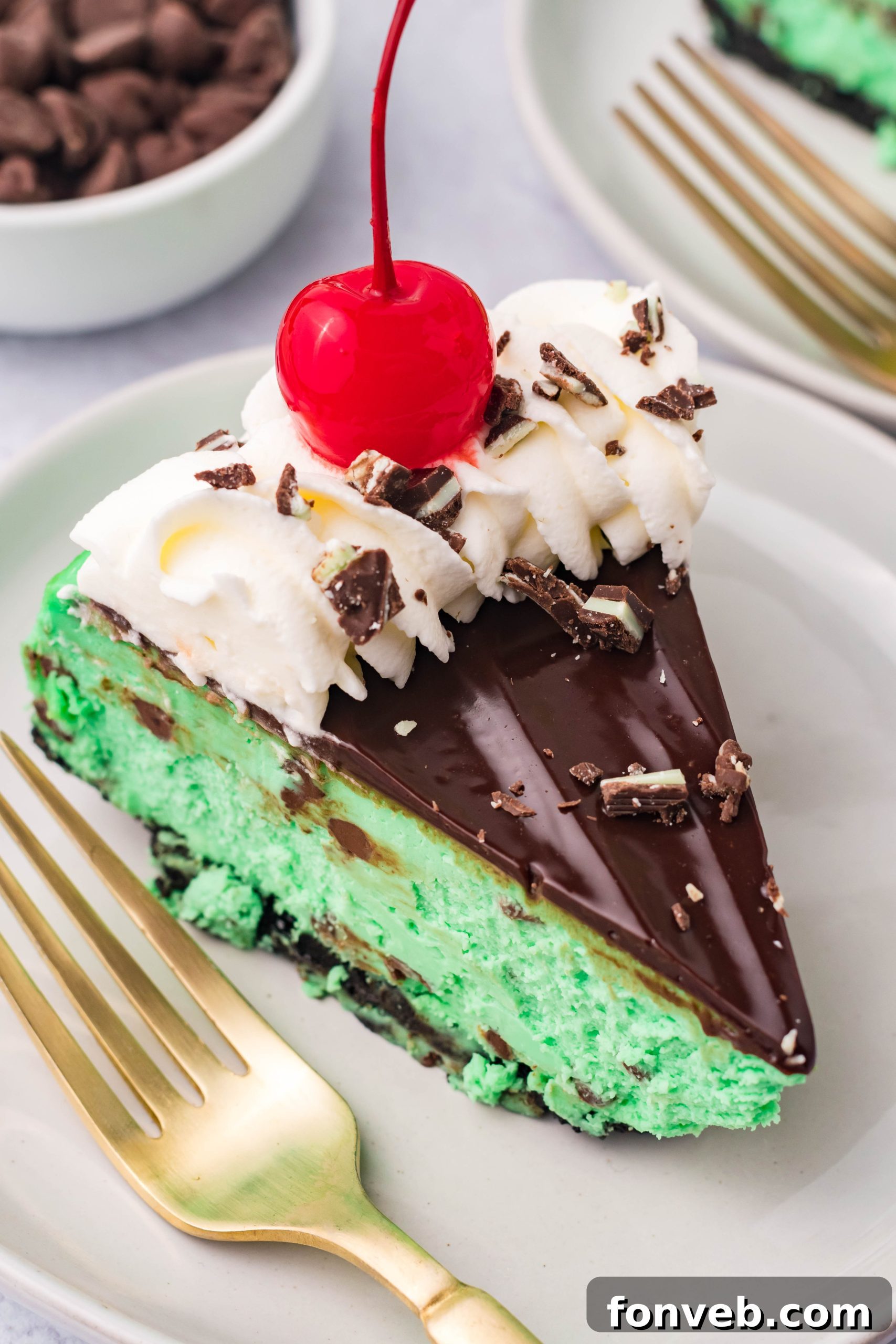 A whole Grasshopper Cheesecake, garnished and ready for serving