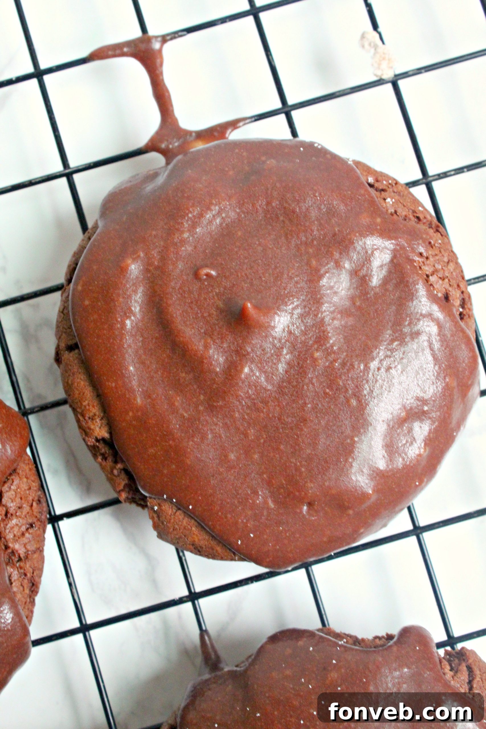 Fudgy Texas Sheet Cake Cookies 8 Texas Sheet Cake Cookies on a plate with milk