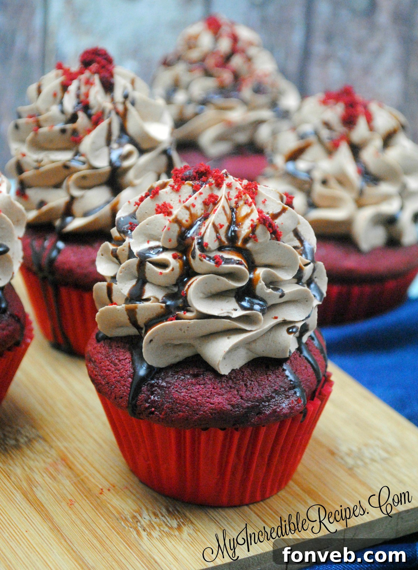 Closeup of a red velvet cupcake, ready to be enjoyed