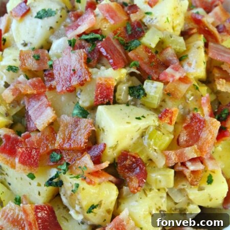 Tangy German Potato Salad 11 The final German Potato Salad, garnished with fresh parsley.