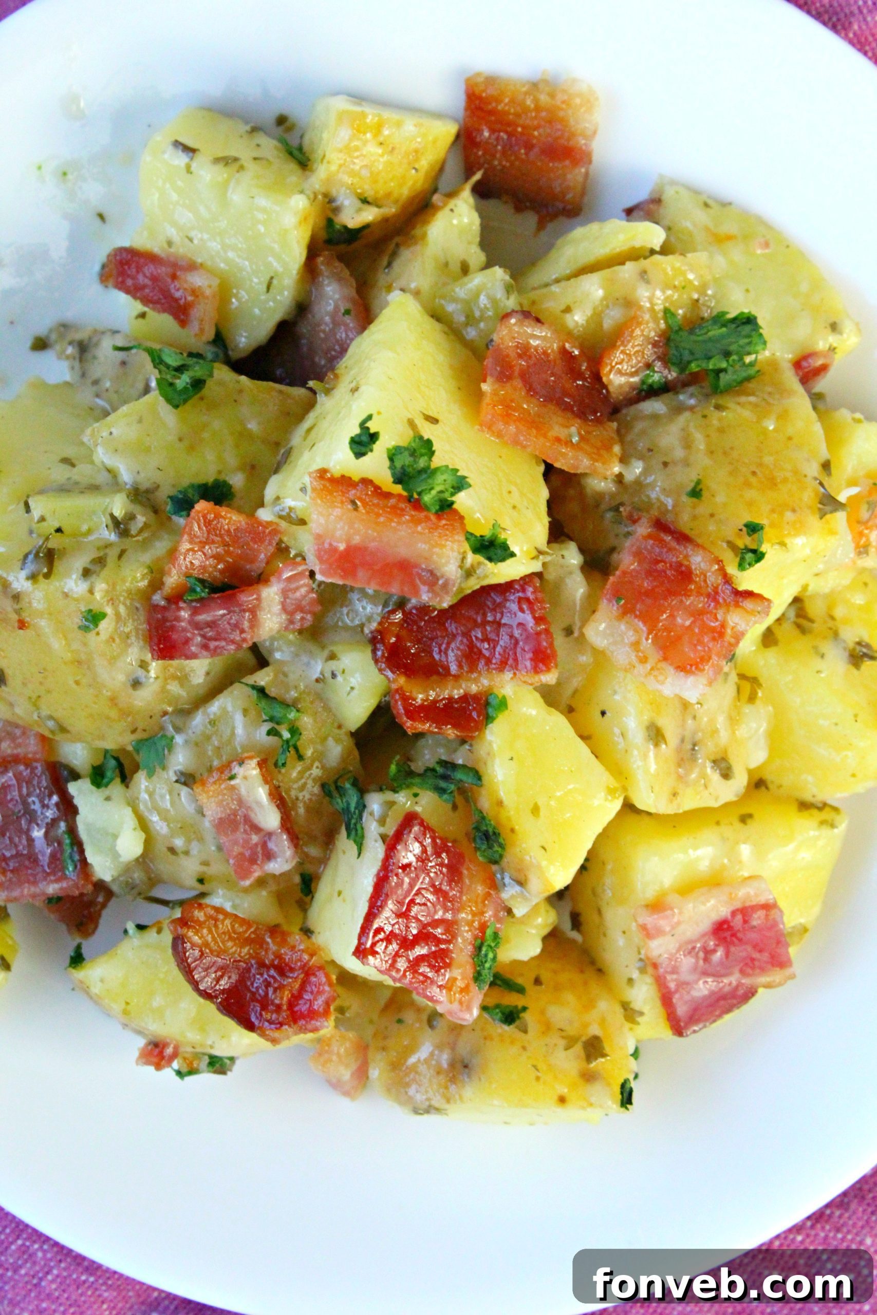 Tangy German Potato Salad 4 Boiled yellow potatoes, cut into bite-sized pieces, ready for the salad.