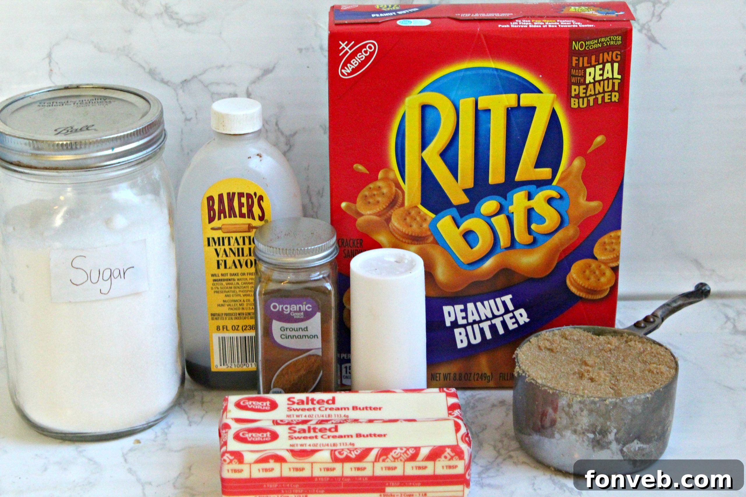 A close-up of golden-brown traditional churros dusted with cinnamon sugar, ready to be enjoyed.