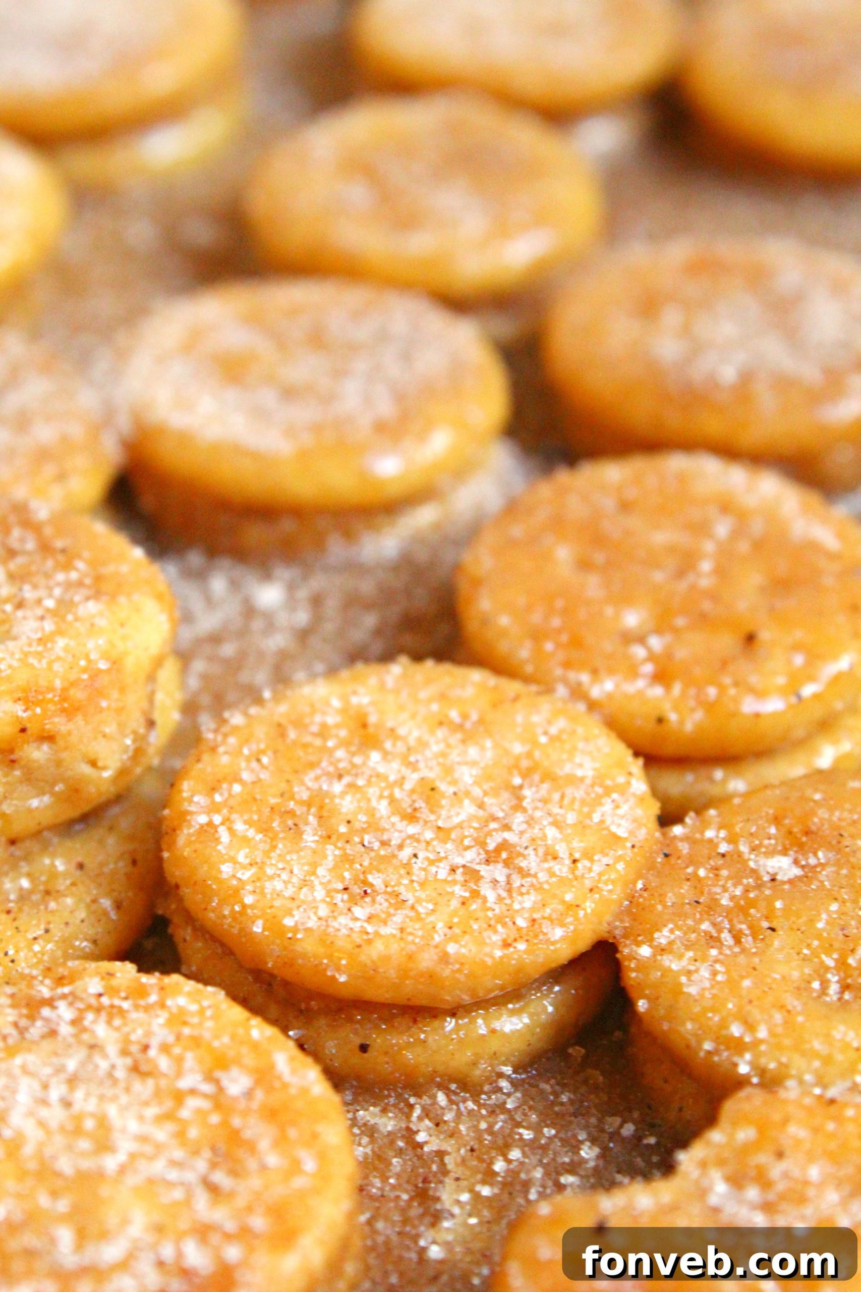 A bowl of Ritz Churro Bites served alongside a cup of coffee, indicating a perfect snack.