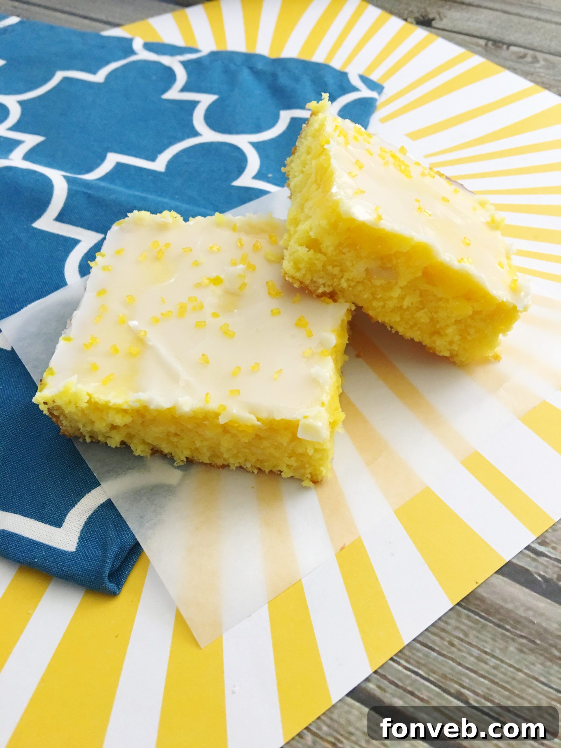 Lemon cream cheese brownie topped with lemon slice and mint