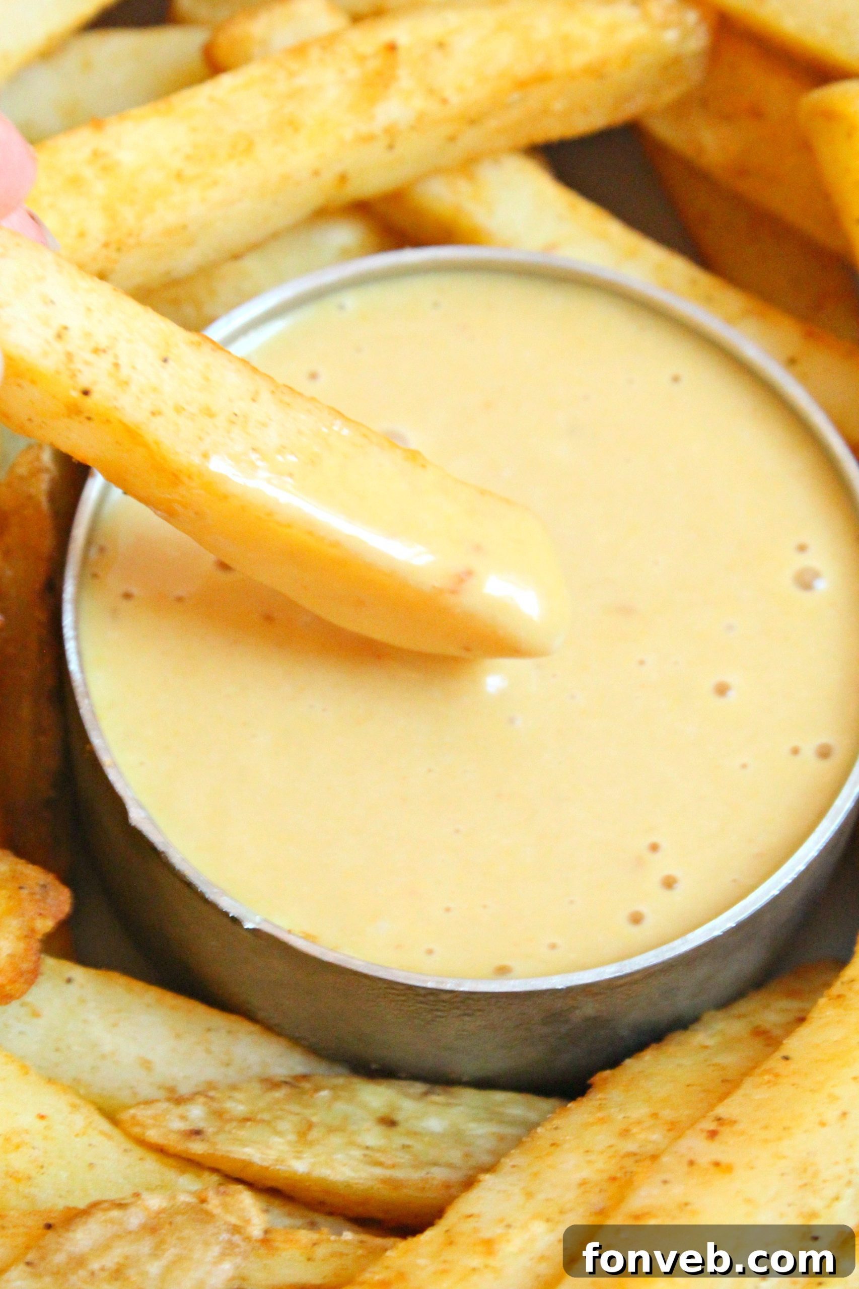 Homemade Chick-Fil-A Sauce in a bowl with chicken nuggets