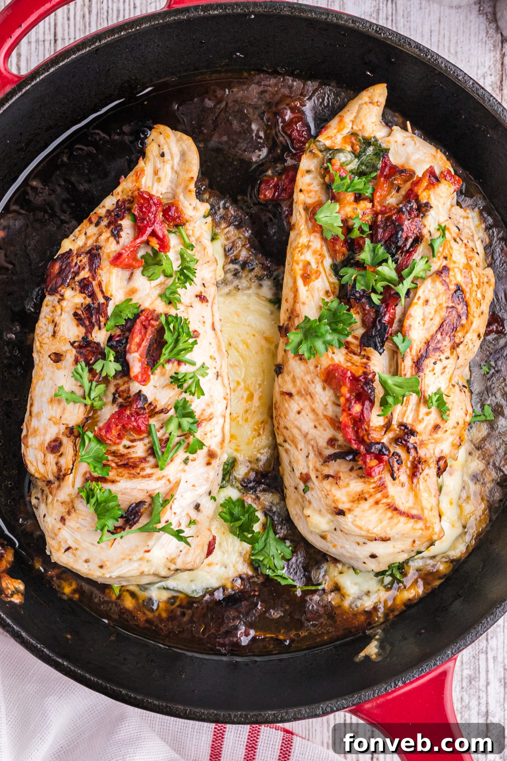 Ingredients for stuffing chicken including sun-dried tomatoes, spinach, and feta cheese