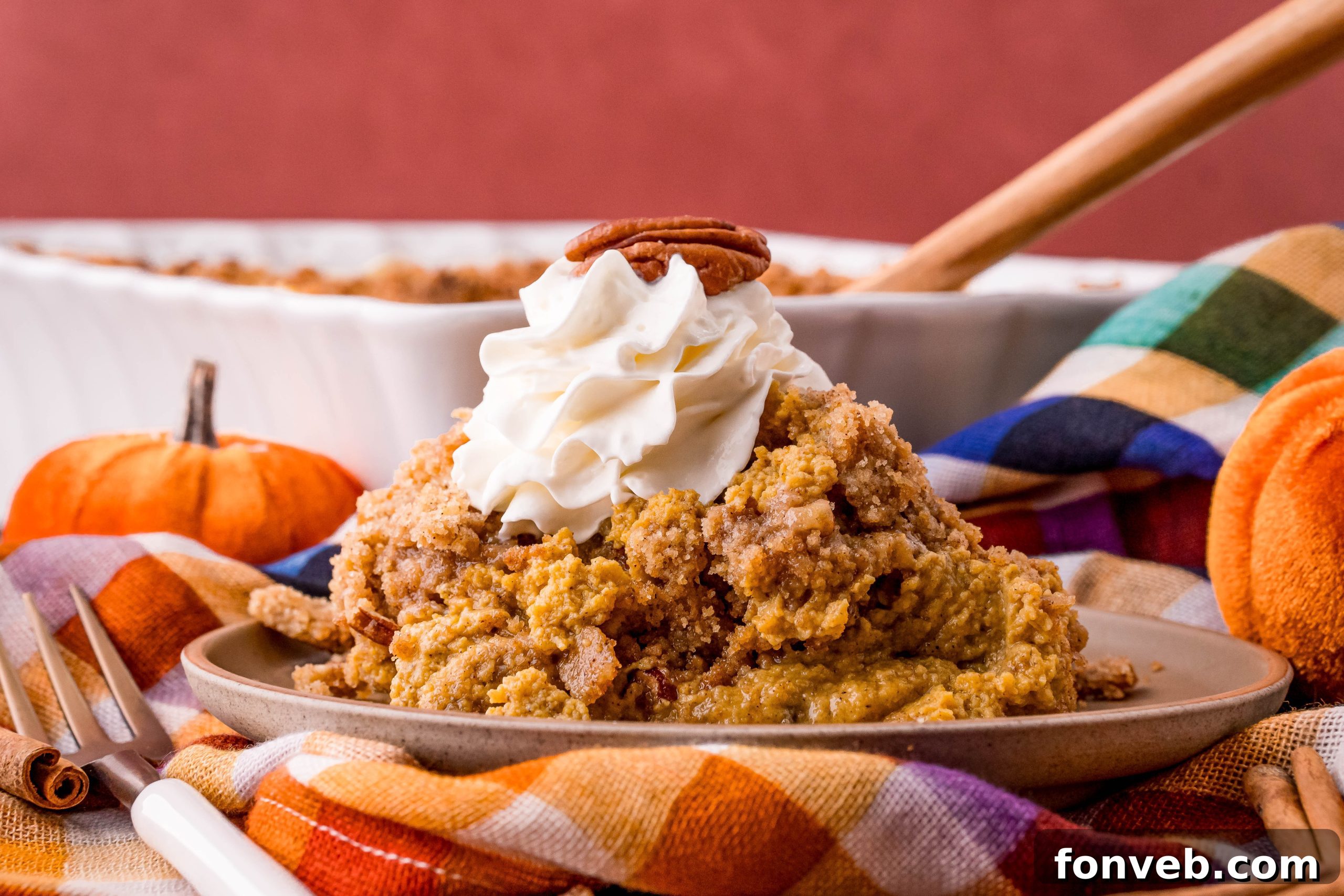 Pumpkin crisp in a bowl with a spoon, ready for breakfast