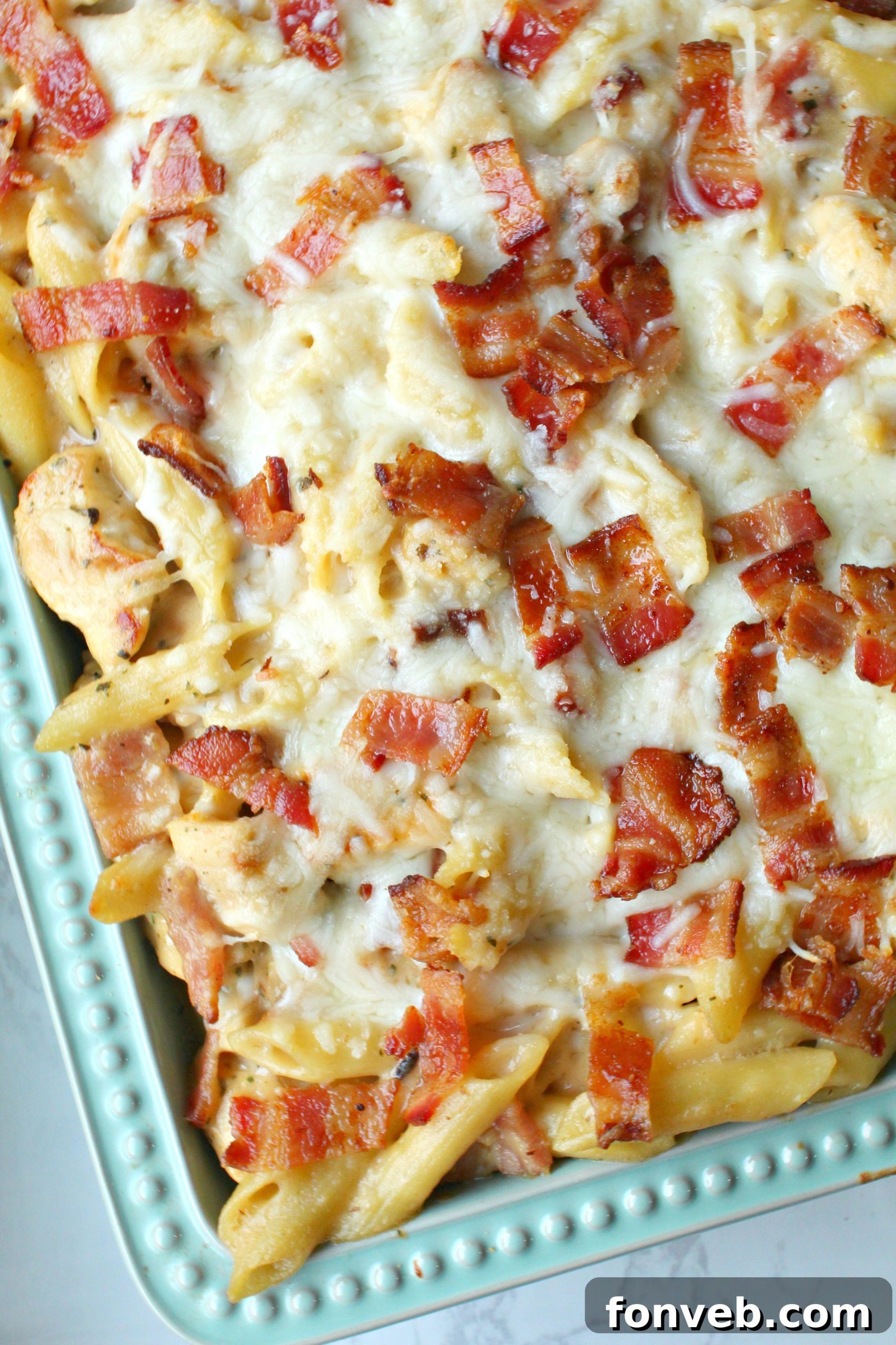 A final shot of the Chicken Bacon Ranch Penne Casserole, garnished with fresh parsley, ready to be served.