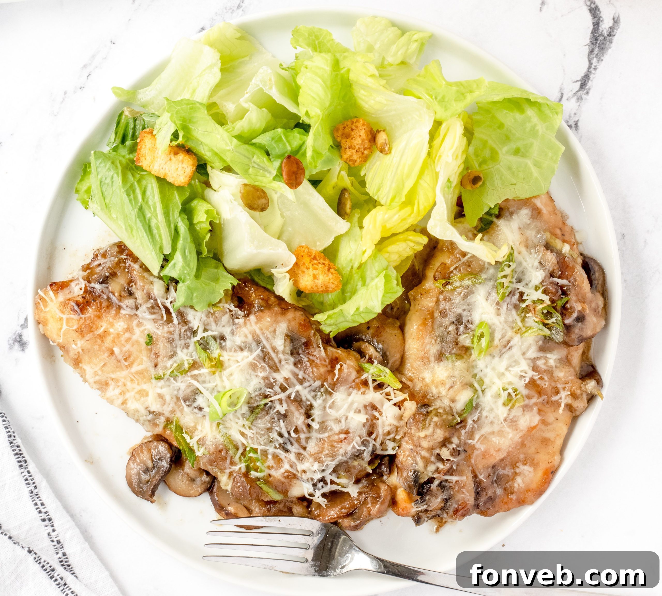 Chicken Lombardy dish cooking in a baking pan