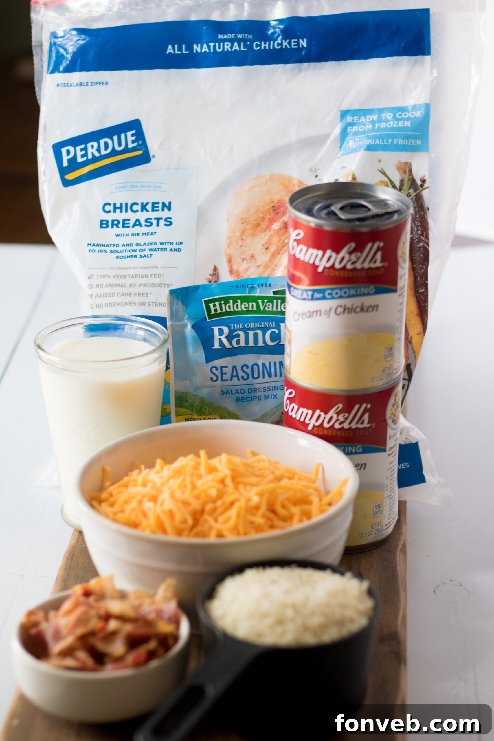 Ingredients for Slow Cooker Cheesy Crack Chicken and Rice, showcasing the simplicity of this dump-and-go recipe.