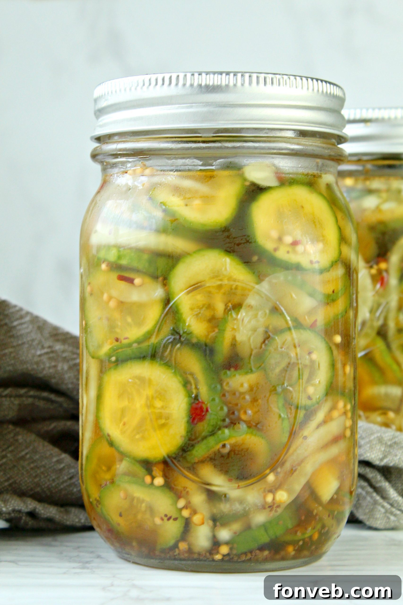 Freshly sliced cucumbers and onions for bread and butter pickles