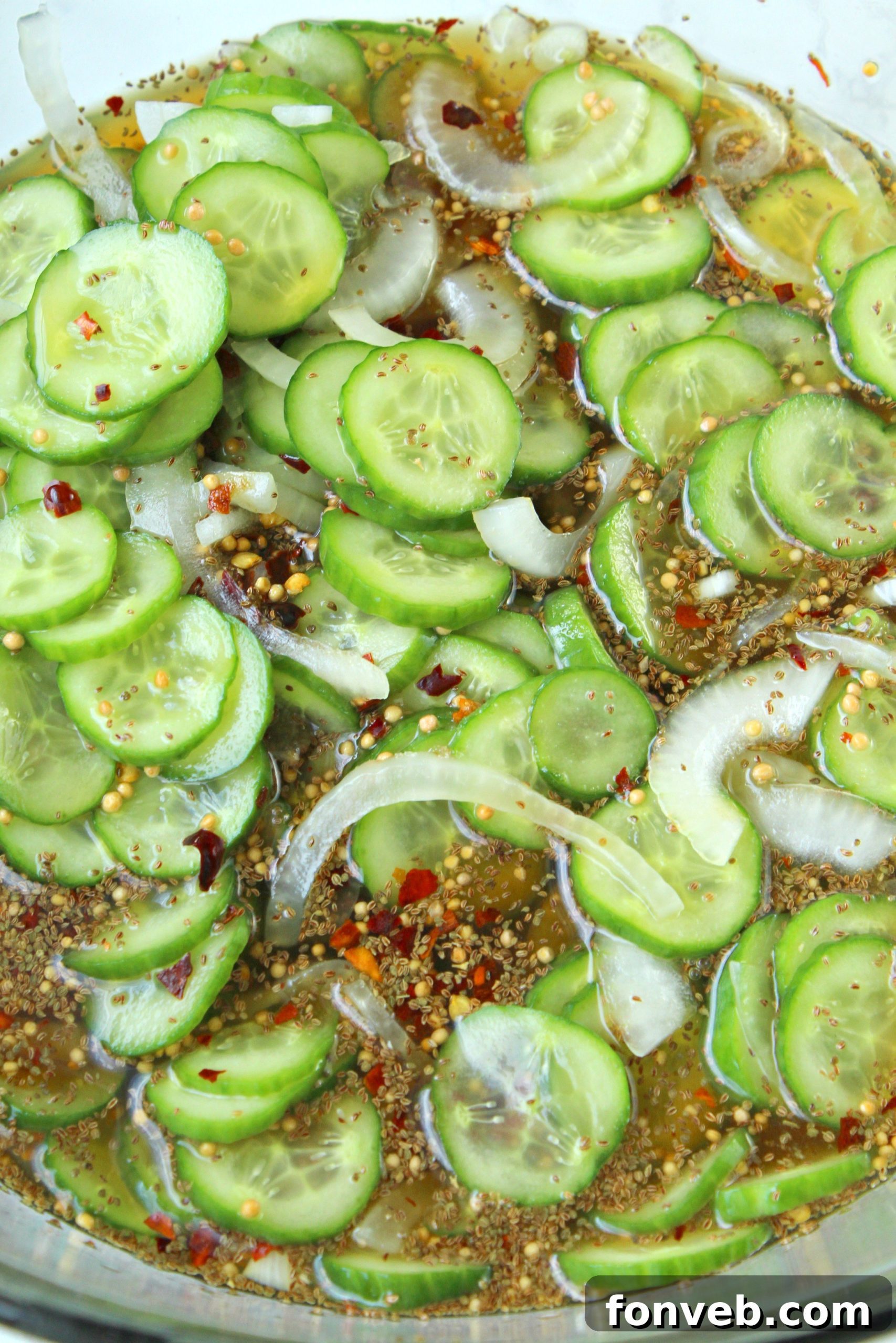 Two jars of homemade bread and butter pickles