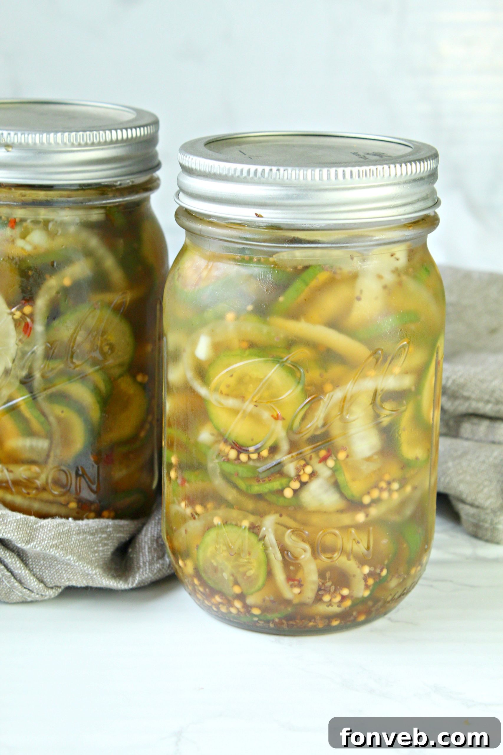 Close-up of bread and butter pickles in a jar