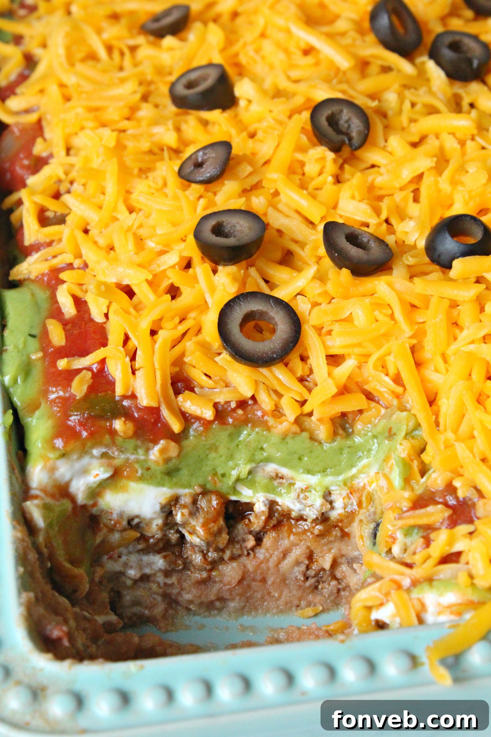 7 Layer Taco Dip 2 7 layer taco dip topped with cheese and olives