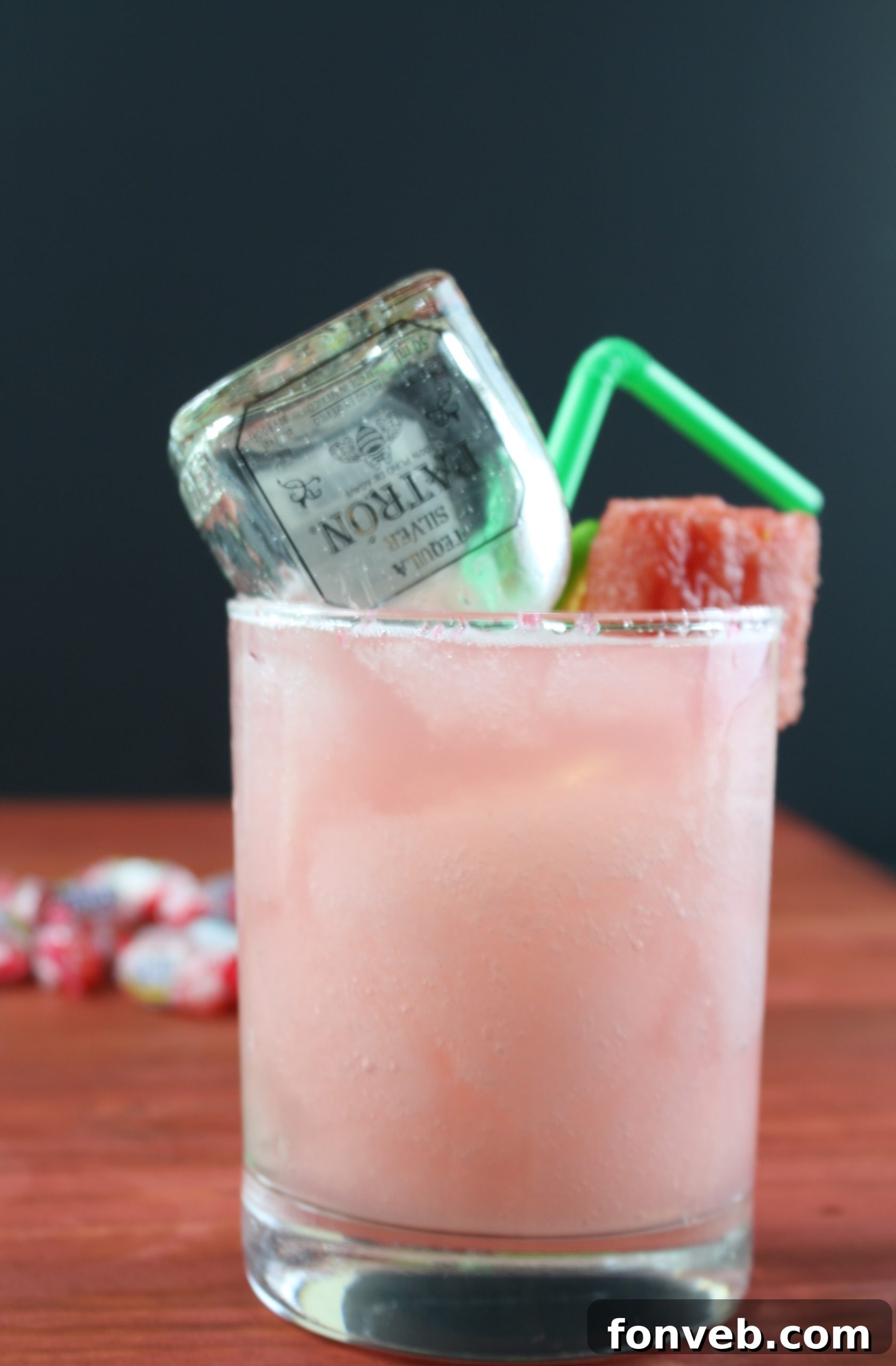 A selection of fresh watermelon slices, perfect for making juice or garnish, laid out on a white surface