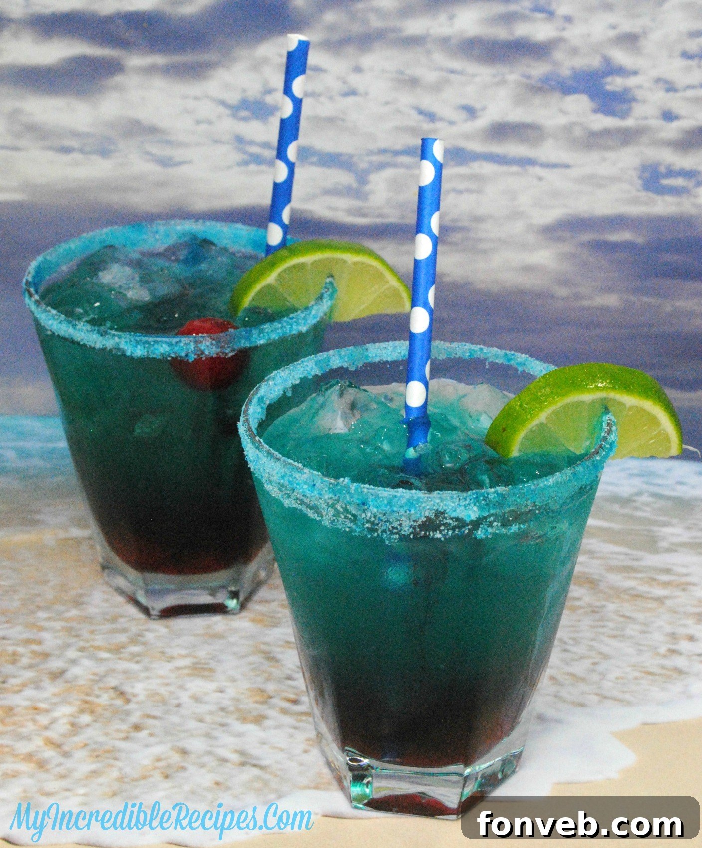 A person holding a freshly made Shark Bite cocktail, ready to enjoy.